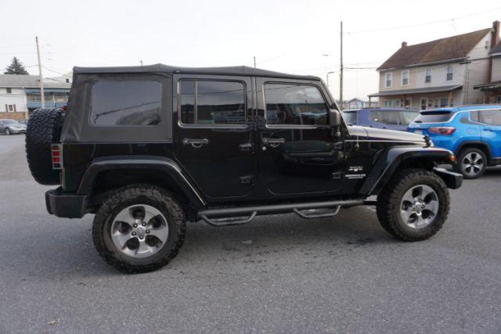 2016 Black Clear Coat /Black, leather Jeep Wrangler Unlimited Sahara 4WD (1C4BJWEG4GL) with an 3.6L V6 DOHC 24V FFV engine, 5-Speed Automatic transmission, located at 312 Centre Ave, Schuylkill Haven, PA, 17972, (570) 593-5278, 40.638130, -76.177383 - automatic climate control, bluetooth, navigation, fixed running boards, hard top, leather seats, remote engine starter, towing pkg, heated front seats, Alpine stereo system - Photo#7