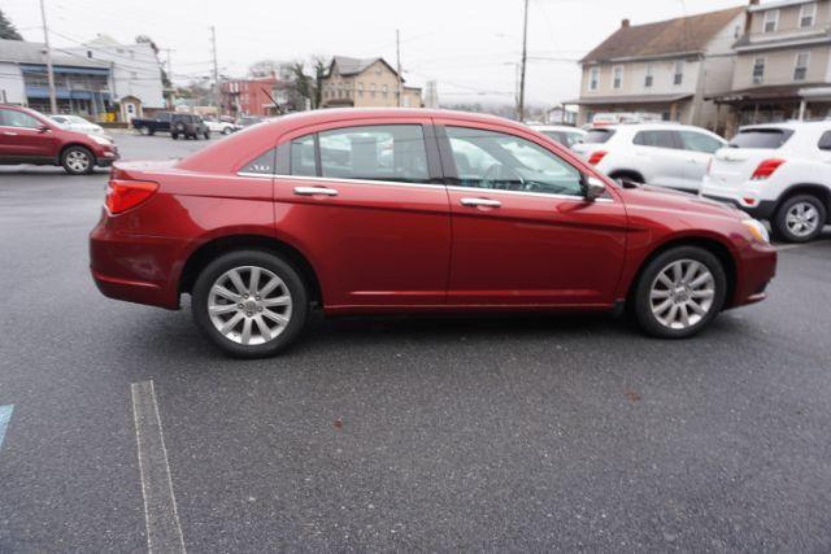 2014 Dp Cherry Red Crystal PC /Black Chrysler 200 Limited (1C3CCBCG6EN) with an 3.6L V6 DOHC 24V FFV engine, 6-Speed Automatic transmission, located at 312 Centre Ave, Schuylkill Haven, PA, 17972, (570) 593-5278, 40.638130, -76.177383 - bluetooth, 3.6L V6 engine, aluminum/alloy wheels, fog lights, leather seats, power driver's seat, remote engine starter, heated front seats, Boston acoustics stereo - Photo#9