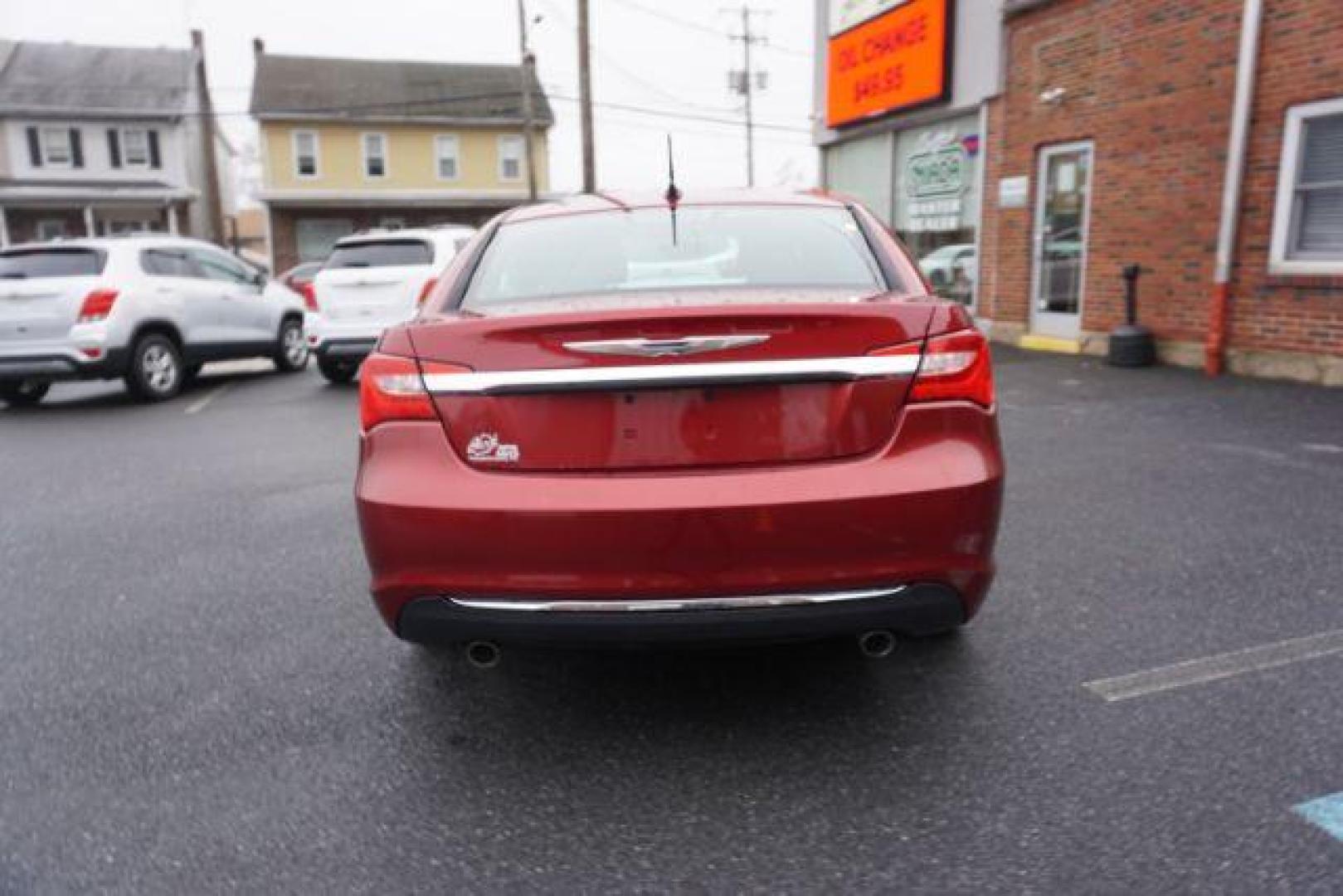 2014 Dp Cherry Red Crystal PC /Black Chrysler 200 Limited (1C3CCBCG6EN) with an 3.6L V6 DOHC 24V FFV engine, 6-Speed Automatic transmission, located at 312 Centre Ave, Schuylkill Haven, PA, 17972, (570) 593-5278, 40.638130, -76.177383 - bluetooth, 3.6L V6 engine, aluminum/alloy wheels, fog lights, leather seats, power driver's seat, remote engine starter, heated front seats, Boston acoustics stereo - Photo#11