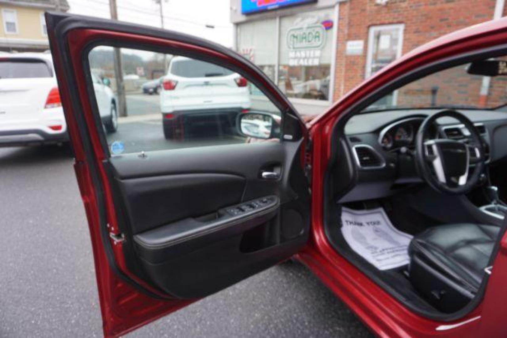 2014 Dp Cherry Red Crystal PC /Black Chrysler 200 Limited (1C3CCBCG6EN) with an 3.6L V6 DOHC 24V FFV engine, 6-Speed Automatic transmission, located at 312 Centre Ave, Schuylkill Haven, PA, 17972, (570) 593-5278, 40.638130, -76.177383 - bluetooth, 3.6L V6 engine, aluminum/alloy wheels, fog lights, leather seats, power driver's seat, remote engine starter, heated front seats, Boston acoustics stereo - Photo#17