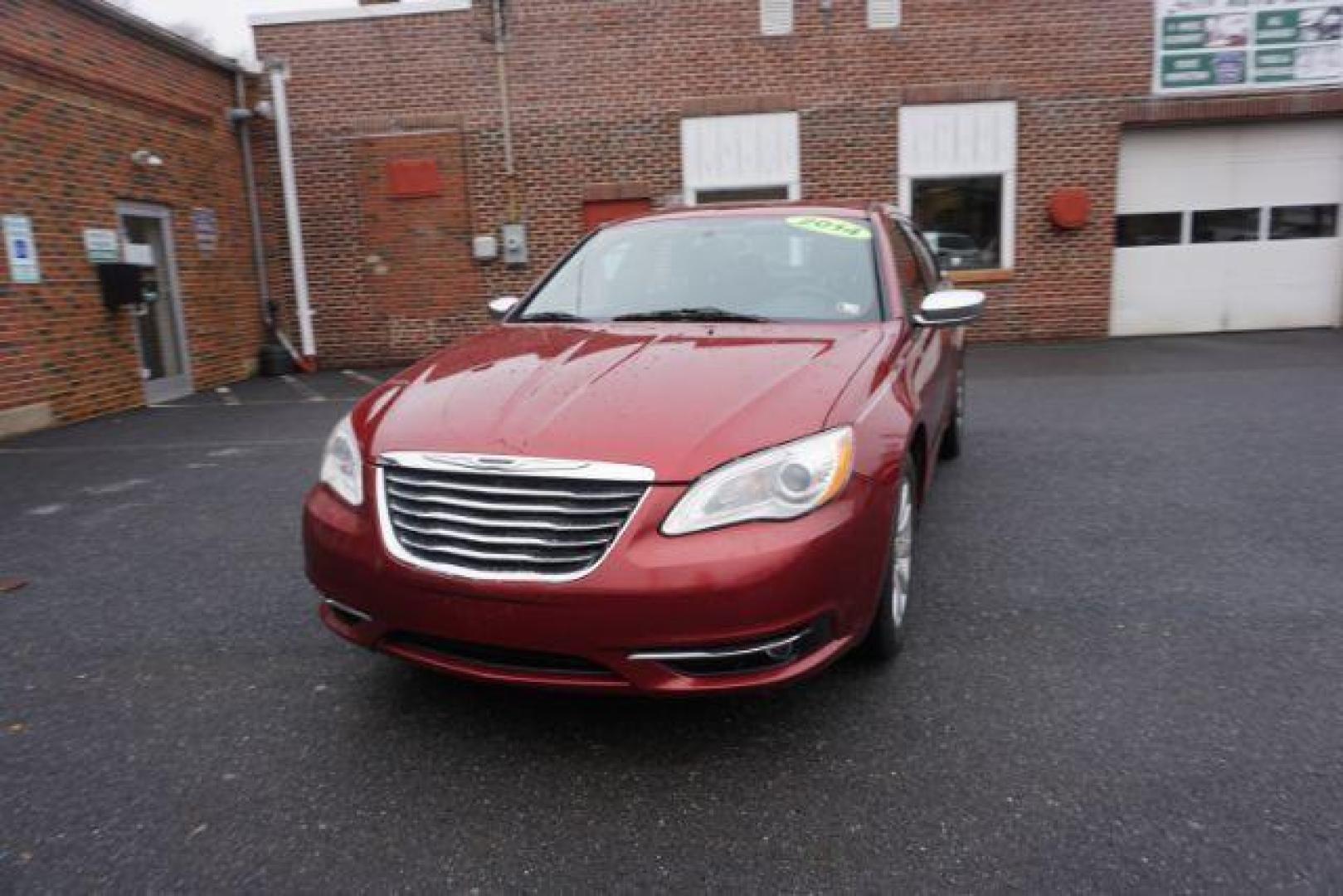 2014 Dp Cherry Red Crystal PC /Black Chrysler 200 Limited (1C3CCBCG6EN) with an 3.6L V6 DOHC 24V FFV engine, 6-Speed Automatic transmission, located at 312 Centre Ave, Schuylkill Haven, PA, 17972, (570) 593-5278, 40.638130, -76.177383 - bluetooth, 3.6L V6 engine, aluminum/alloy wheels, fog lights, leather seats, power driver's seat, remote engine starter, heated front seats, Boston acoustics stereo - Photo#3