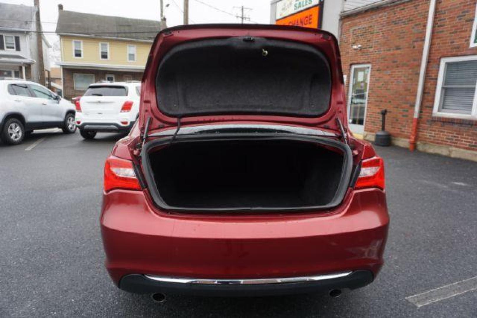 2014 Dp Cherry Red Crystal PC /Black Chrysler 200 Limited (1C3CCBCG6EN) with an 3.6L V6 DOHC 24V FFV engine, 6-Speed Automatic transmission, located at 312 Centre Ave, Schuylkill Haven, PA, 17972, (570) 593-5278, 40.638130, -76.177383 - bluetooth, 3.6L V6 engine, aluminum/alloy wheels, fog lights, leather seats, power driver's seat, remote engine starter, heated front seats, Boston acoustics stereo - Photo#39