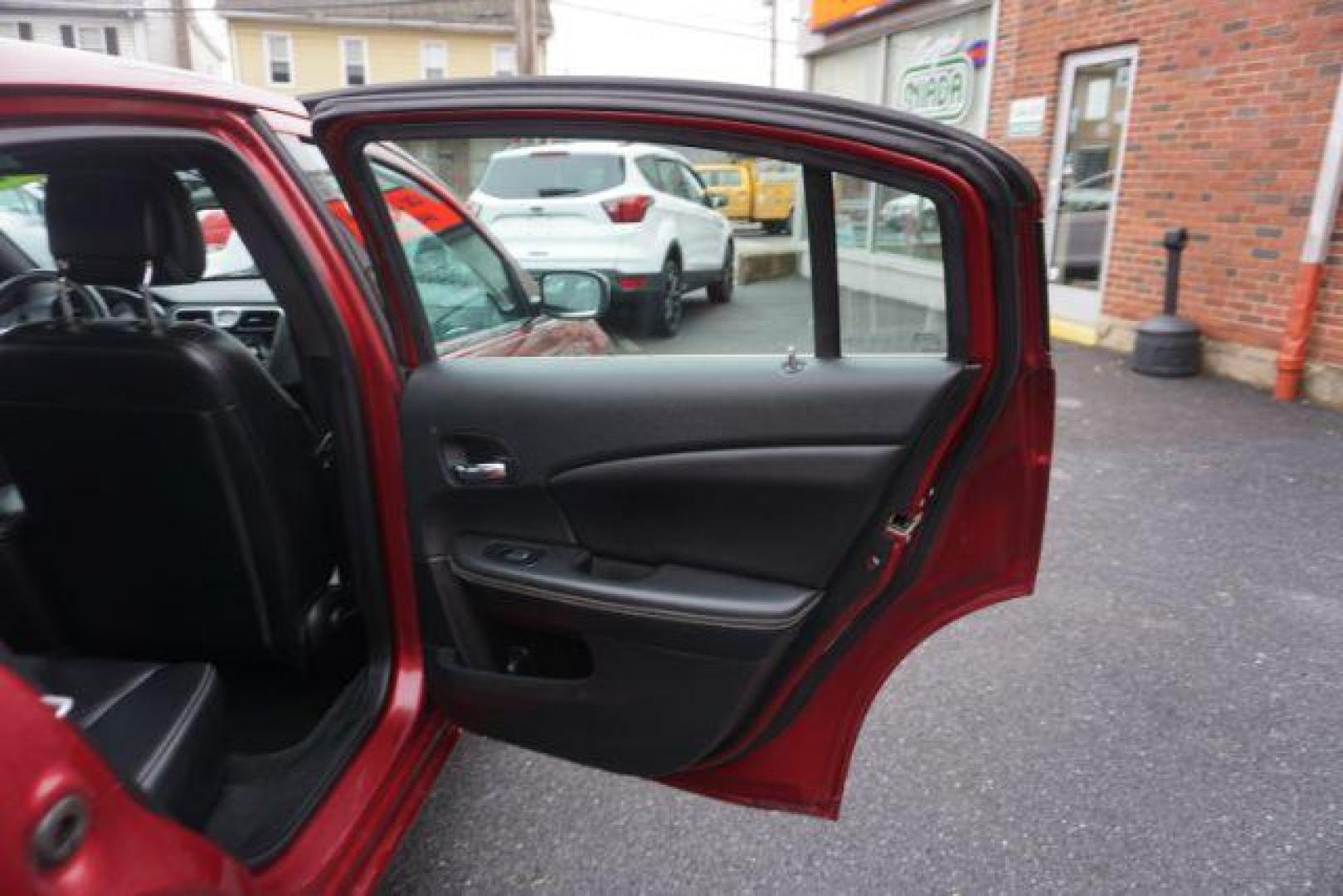 2014 Dp Cherry Red Crystal PC /Black Chrysler 200 Limited (1C3CCBCG6EN) with an 3.6L V6 DOHC 24V FFV engine, 6-Speed Automatic transmission, located at 312 Centre Ave, Schuylkill Haven, PA, 17972, (570) 593-5278, 40.638130, -76.177383 - bluetooth, 3.6L V6 engine, aluminum/alloy wheels, fog lights, leather seats, power driver's seat, remote engine starter, heated front seats, Boston acoustics stereo - Photo#41