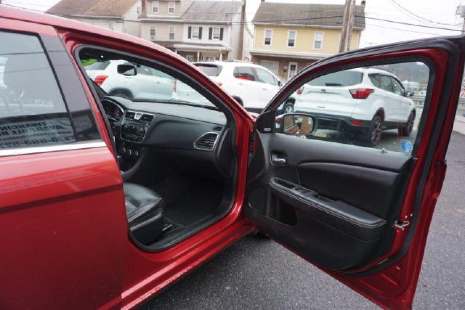 2014 Dp Cherry Red Crystal PC /Black Chrysler 200 Limited (1C3CCBCG6EN) with an 3.6L V6 DOHC 24V FFV engine, 6-Speed Automatic transmission, located at 312 Centre Ave, Schuylkill Haven, PA, 17972, (570) 593-5278, 40.638130, -76.177383 - bluetooth, 3.6L V6 engine, aluminum/alloy wheels, fog lights, leather seats, power driver's seat, remote engine starter, heated front seats, Boston acoustics stereo - Photo#45