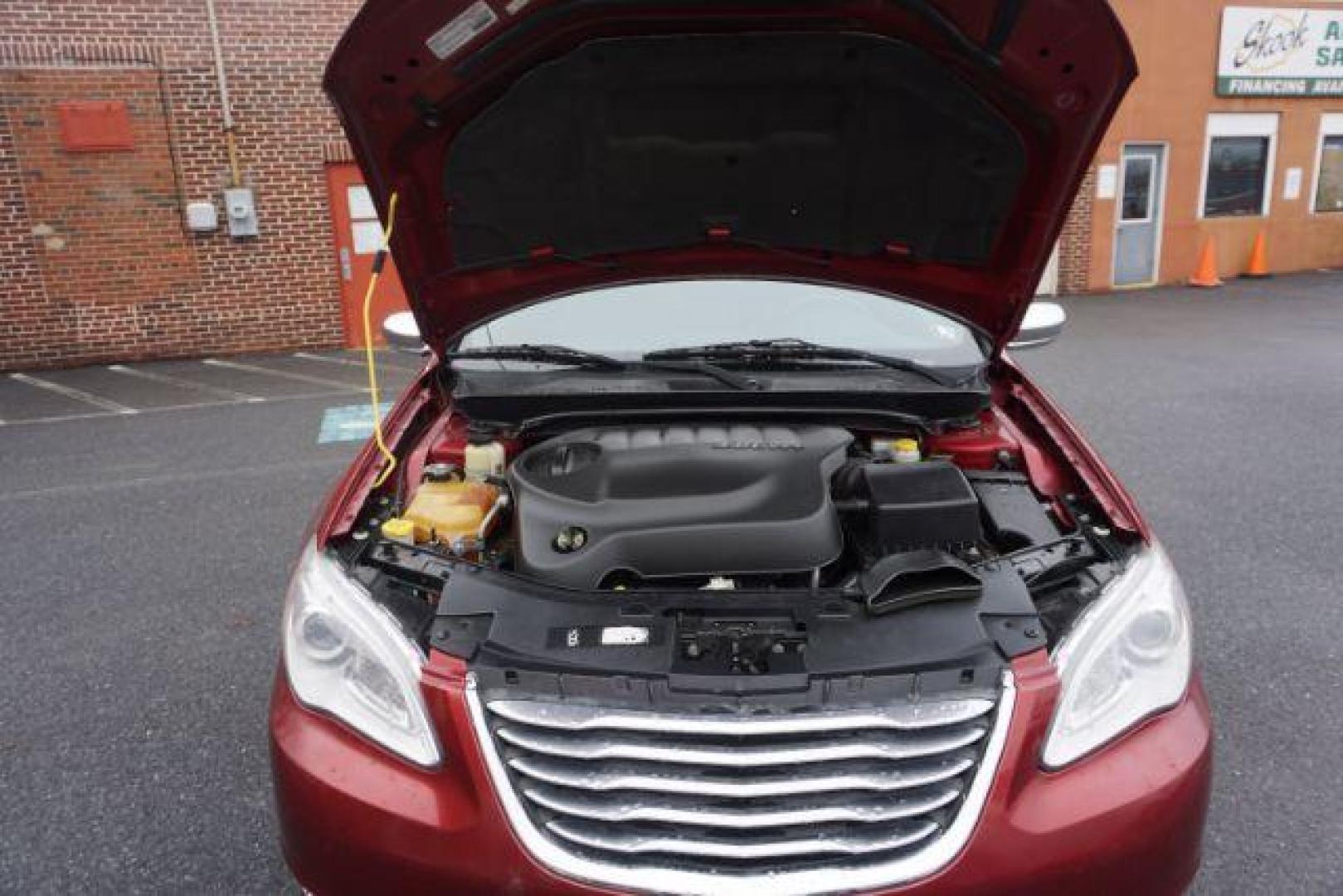 2014 Dp Cherry Red Crystal PC /Black Chrysler 200 Limited (1C3CCBCG6EN) with an 3.6L V6 DOHC 24V FFV engine, 6-Speed Automatic transmission, located at 312 Centre Ave, Schuylkill Haven, PA, 17972, (570) 593-5278, 40.638130, -76.177383 - bluetooth, 3.6L V6 engine, aluminum/alloy wheels, fog lights, leather seats, power driver's seat, remote engine starter, heated front seats, Boston acoustics stereo - Photo#51