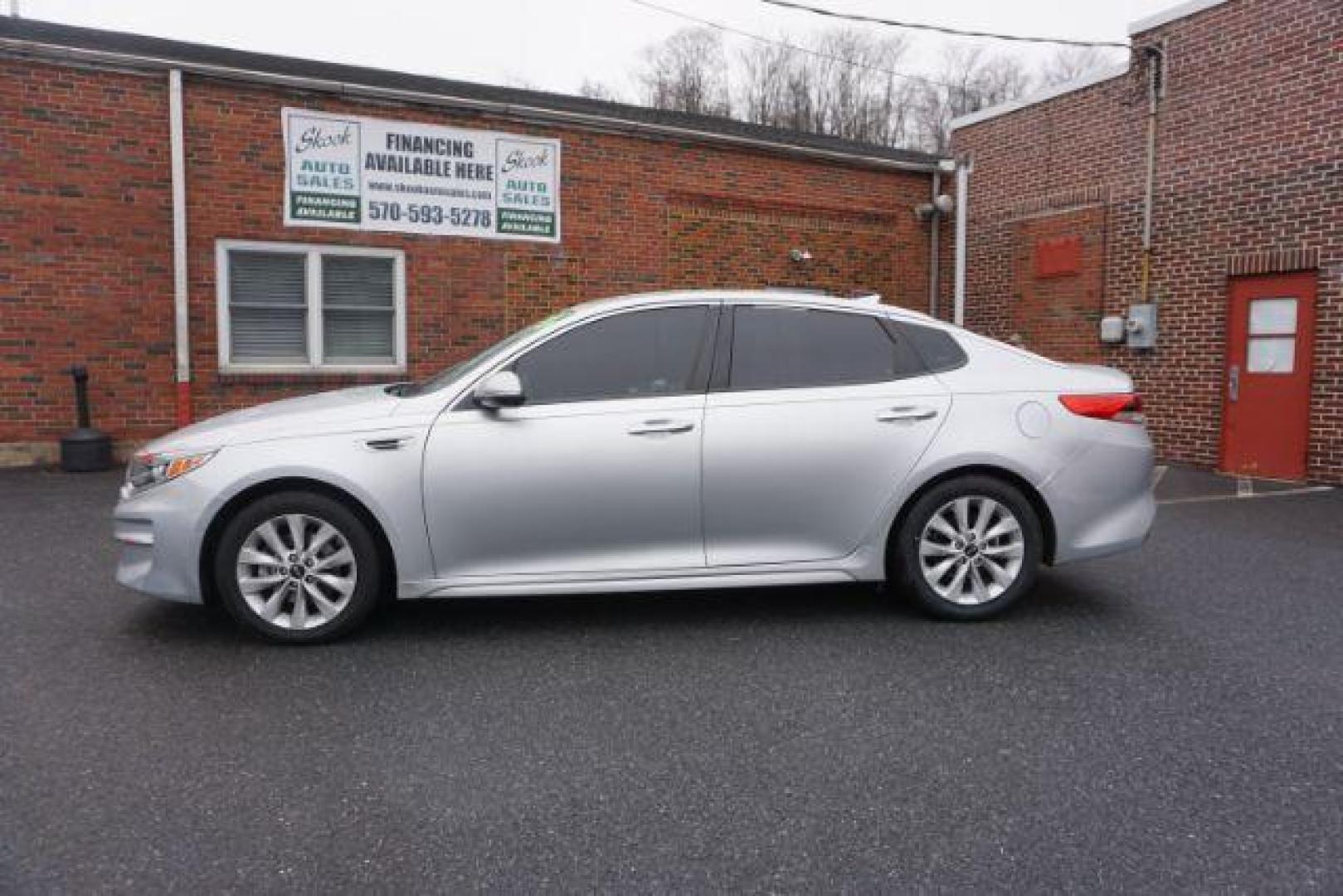 2018 Silky Silver /Black Cloth, cloth Kia Optima LX (5XXGT4L3XJG) with an 2.4L L4 DOHC 16V engine, 6-Speed Automatic transmission, located at 312 Centre Ave, Schuylkill Haven, PA, 17972, (570) 593-5278, 40.638130, -76.177383 - blind spot monitor, rear parking sensors - Photo#0