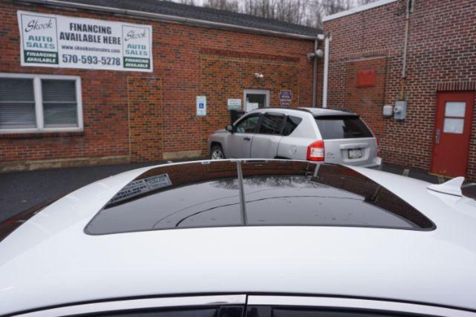 2016 Bright White Clear Coat /black leather Chrysler 200 C AWD (1C3CCCEG7GN) with an 3.6L V6 DOHC 24V FFV engine, 9-Speed Automatic transmission, located at 312 Centre Ave, Schuylkill Haven, PA, 17972, (570) 593-5278, 40.638130, -76.177383 - bluetooth, navigation, aluminum/alloy wheels, leather seats, power passenger seat, power sunroof, Alpine Stereo System - Photo#14