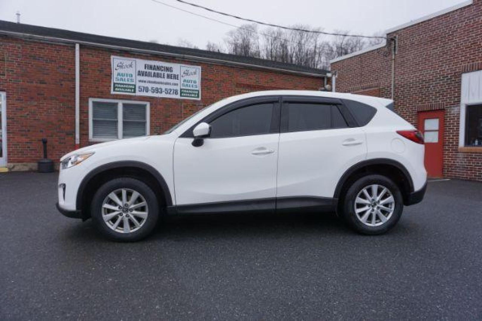 2014 Crystal White Pearl Mica /Sand Mazda CX-5 Touring AWD (JM3KE4CY4E0) with an 2.5L L4 DOHC 16V engine, 6-Speed Automatic transmission, located at 312 Centre Ave, Schuylkill Haven, PA, 17972, (570) 593-5278, 40.638130, -76.177383 - bluetooth, navigation system, fog lights - Photo#0