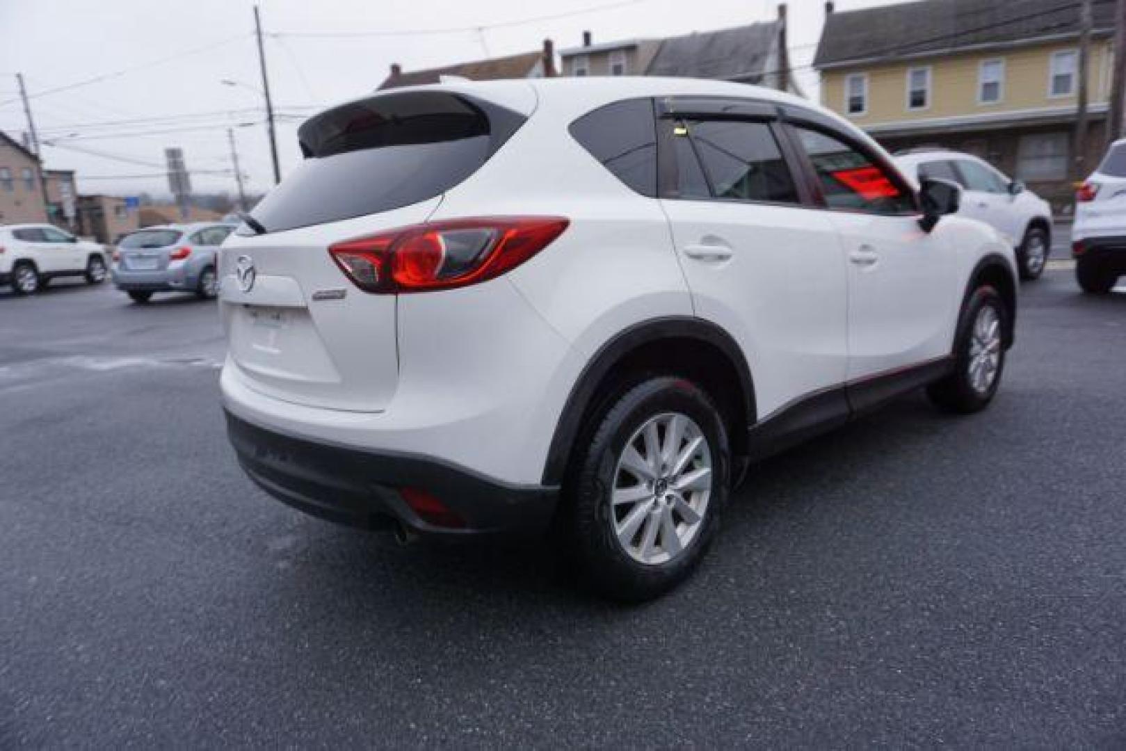 2014 Crystal White Pearl Mica /Sand Mazda CX-5 Touring AWD (JM3KE4CY4E0) with an 2.5L L4 DOHC 16V engine, 6-Speed Automatic transmission, located at 312 Centre Ave, Schuylkill Haven, PA, 17972, (570) 593-5278, 40.638130, -76.177383 - bluetooth, navigation system, fog lights - Photo#9