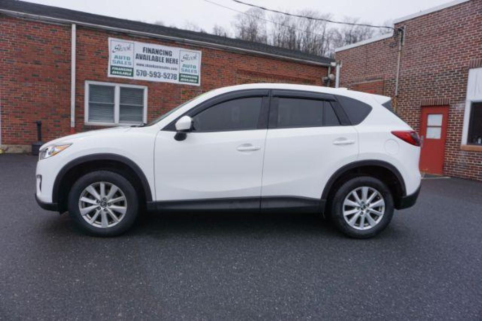 2014 Crystal White Pearl Mica /Sand Mazda CX-5 Touring AWD (JM3KE4CY4E0) with an 2.5L L4 DOHC 16V engine, 6-Speed Automatic transmission, located at 312 Centre Ave, Schuylkill Haven, PA, 17972, (570) 593-5278, 40.638130, -76.177383 - bluetooth, navigation system, fog lights - Photo#14