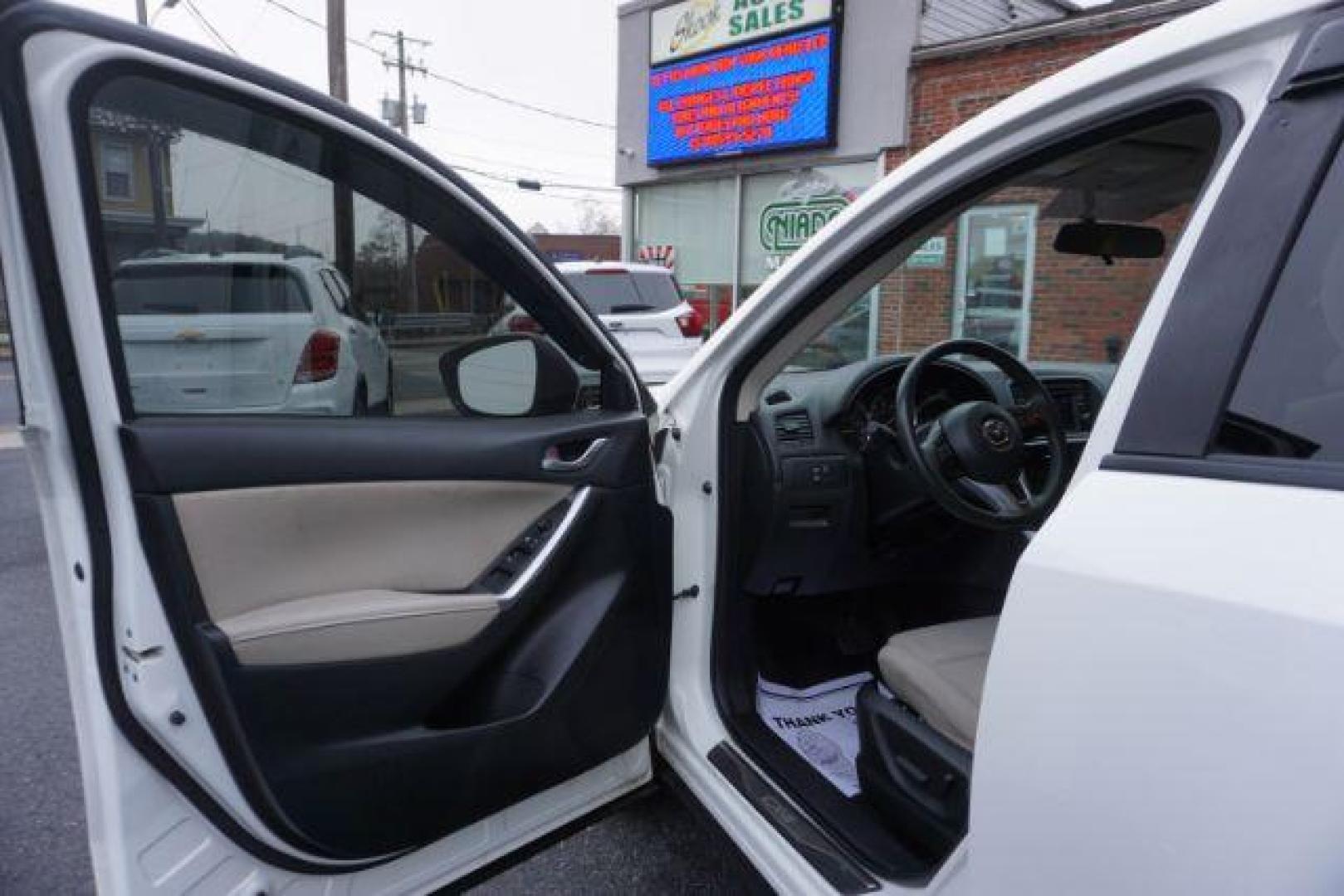 2014 Crystal White Pearl Mica /Sand Mazda CX-5 Touring AWD (JM3KE4CY4E0) with an 2.5L L4 DOHC 16V engine, 6-Speed Automatic transmission, located at 312 Centre Ave, Schuylkill Haven, PA, 17972, (570) 593-5278, 40.638130, -76.177383 - bluetooth, navigation system, fog lights - Photo#15