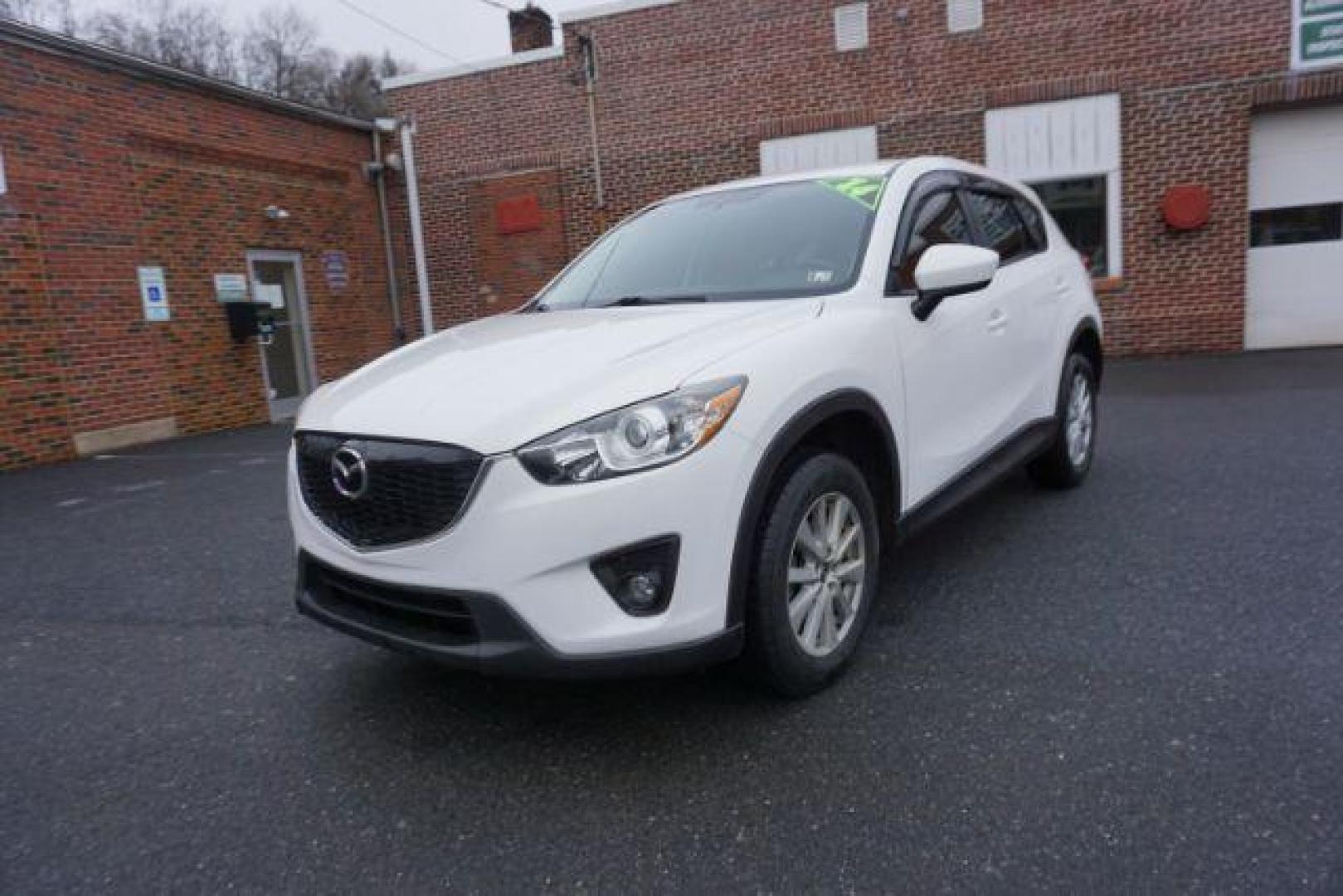 2014 Crystal White Pearl Mica /Sand Mazda CX-5 Touring AWD (JM3KE4CY4E0) with an 2.5L L4 DOHC 16V engine, 6-Speed Automatic transmission, located at 312 Centre Ave, Schuylkill Haven, PA, 17972, (570) 593-5278, 40.638130, -76.177383 - bluetooth, navigation system, fog lights - Photo#2