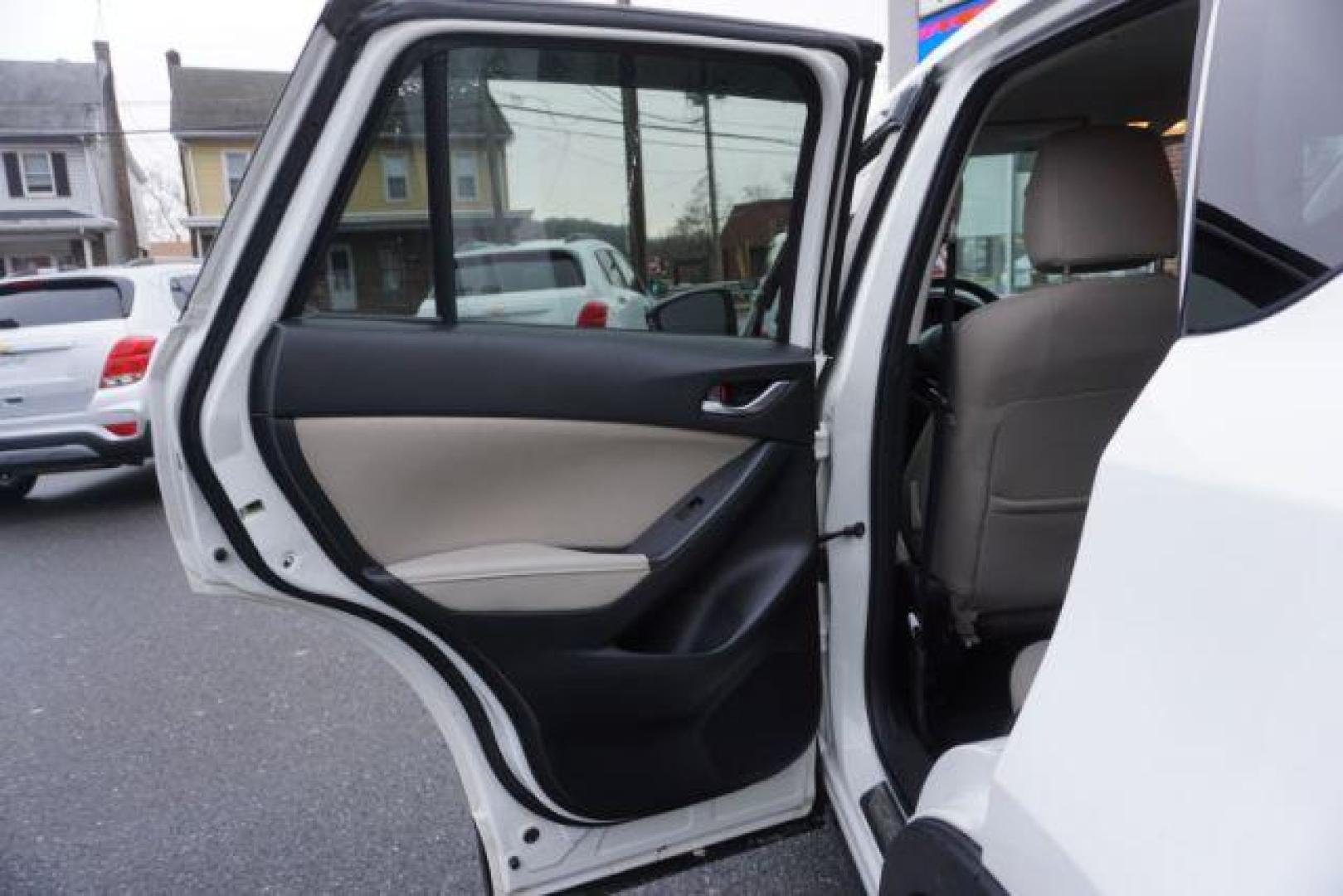 2014 Crystal White Pearl Mica /Sand Mazda CX-5 Touring AWD (JM3KE4CY4E0) with an 2.5L L4 DOHC 16V engine, 6-Speed Automatic transmission, located at 312 Centre Ave, Schuylkill Haven, PA, 17972, (570) 593-5278, 40.638130, -76.177383 - bluetooth, navigation system, fog lights - Photo#29