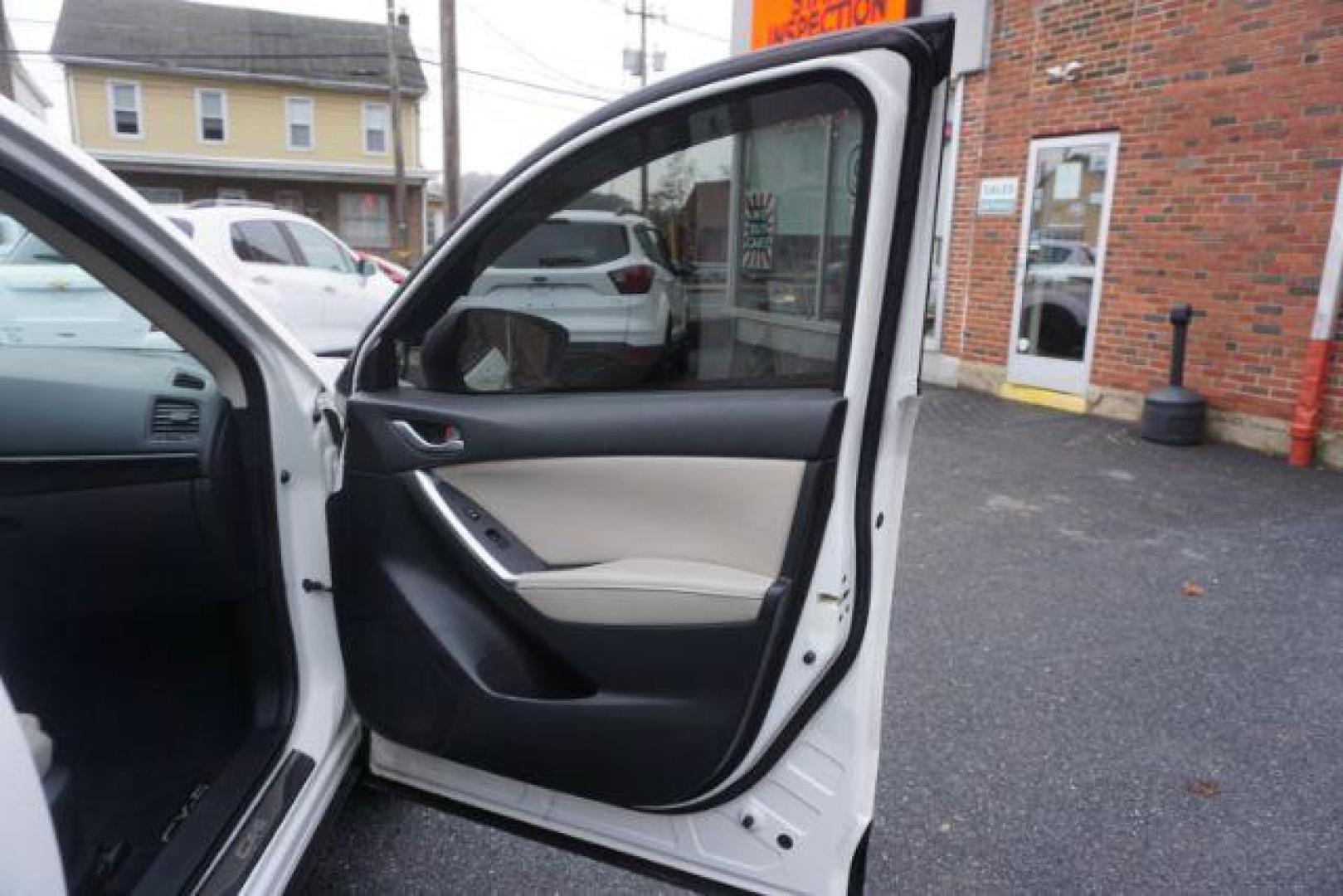 2014 Crystal White Pearl Mica /Sand Mazda CX-5 Touring AWD (JM3KE4CY4E0) with an 2.5L L4 DOHC 16V engine, 6-Speed Automatic transmission, located at 312 Centre Ave, Schuylkill Haven, PA, 17972, (570) 593-5278, 40.638130, -76.177383 - bluetooth, navigation system, fog lights - Photo#45