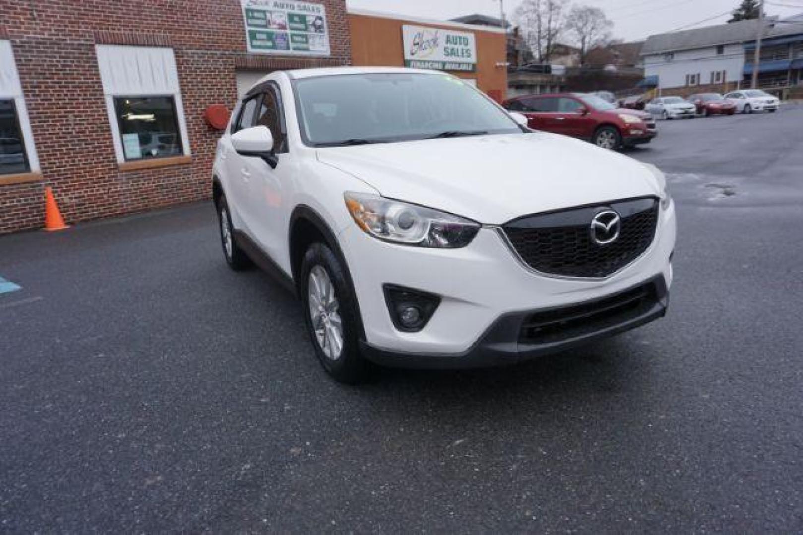 2014 Crystal White Pearl Mica /Sand Mazda CX-5 Touring AWD (JM3KE4CY4E0) with an 2.5L L4 DOHC 16V engine, 6-Speed Automatic transmission, located at 312 Centre Ave, Schuylkill Haven, PA, 17972, (570) 593-5278, 40.638130, -76.177383 - bluetooth, navigation system, fog lights - Photo#4