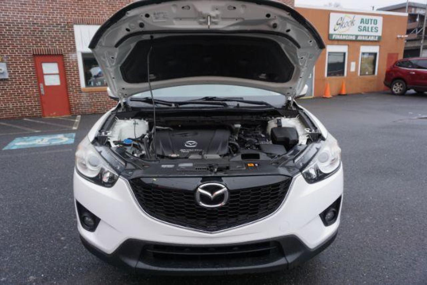 2014 Crystal White Pearl Mica /Sand Mazda CX-5 Touring AWD (JM3KE4CY4E0) with an 2.5L L4 DOHC 16V engine, 6-Speed Automatic transmission, located at 312 Centre Ave, Schuylkill Haven, PA, 17972, (570) 593-5278, 40.638130, -76.177383 - bluetooth, navigation system, fog lights - Photo#51