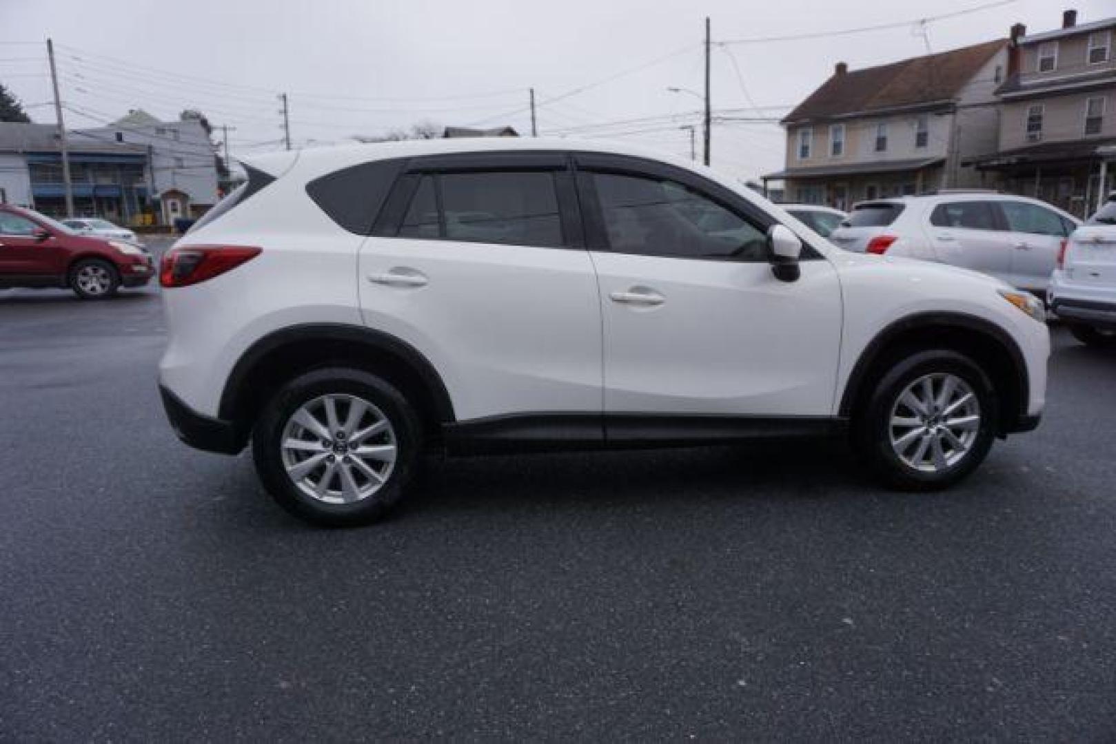 2014 Crystal White Pearl Mica /Sand Mazda CX-5 Touring AWD (JM3KE4CY4E0) with an 2.5L L4 DOHC 16V engine, 6-Speed Automatic transmission, located at 312 Centre Ave, Schuylkill Haven, PA, 17972, (570) 593-5278, 40.638130, -76.177383 - bluetooth, navigation system, fog lights - Photo#8