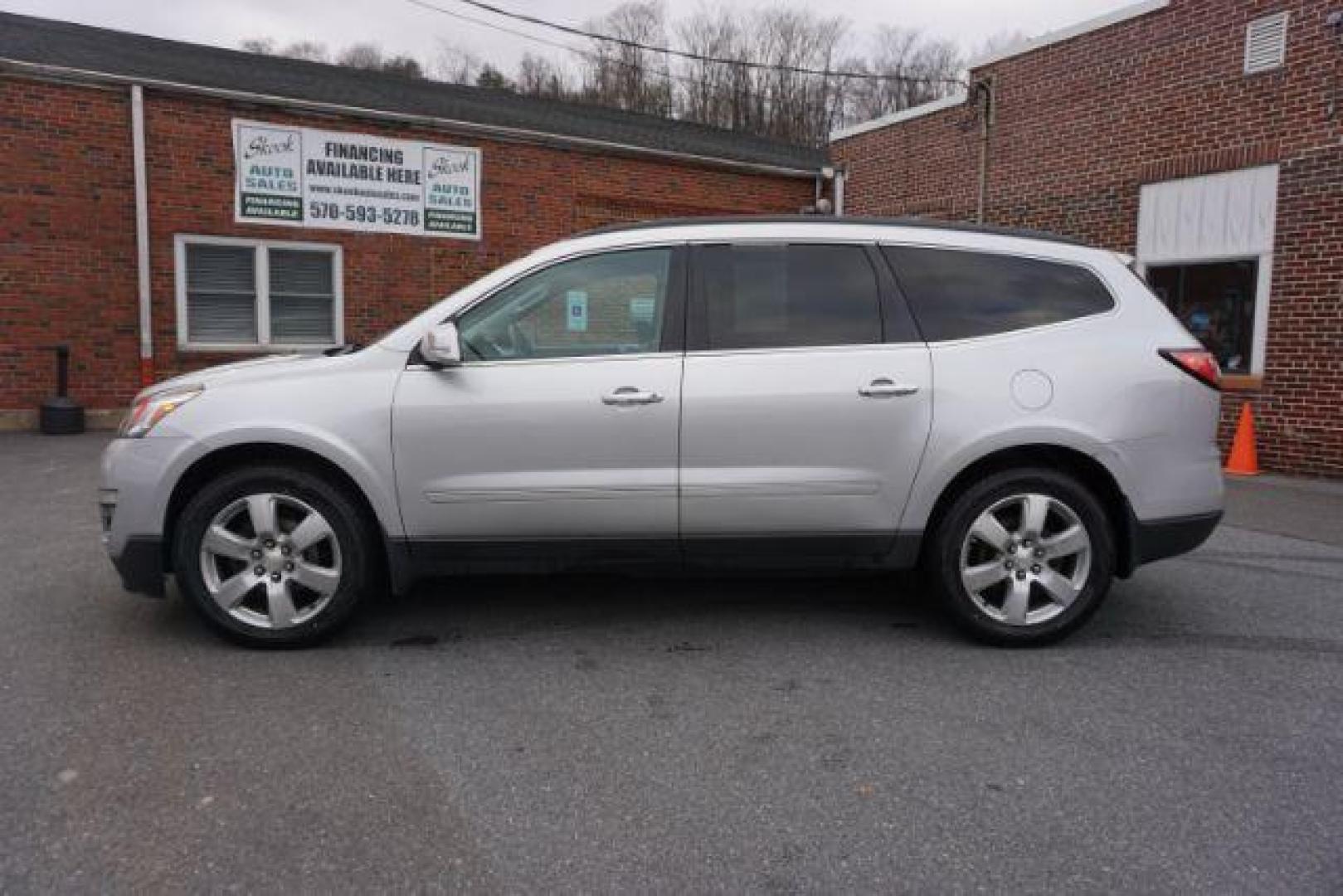 2017 Silver Ice Metallic /Ebony, premium leather Chevrolet Traverse Premier AWD (1GNKVJKD2HJ) with an 3.6L V6 DOHC 24V engine, 6-Speed Automatic transmission, located at 312 Centre Ave, Schuylkill Haven, PA, 17972, (570) 593-5278, 40.638130, -76.177383 - automatic climate control, blind spot monitor, navigation, rear parking sensors, univ garage door opener, aluminum/alloy wheels, leather seats, luggage rack, power driver's seat, power passenger seat, rear bucket seats, towing/camper pkg, driver's seat memory, heated front seats, Bose Premium Stereo - Photo#0