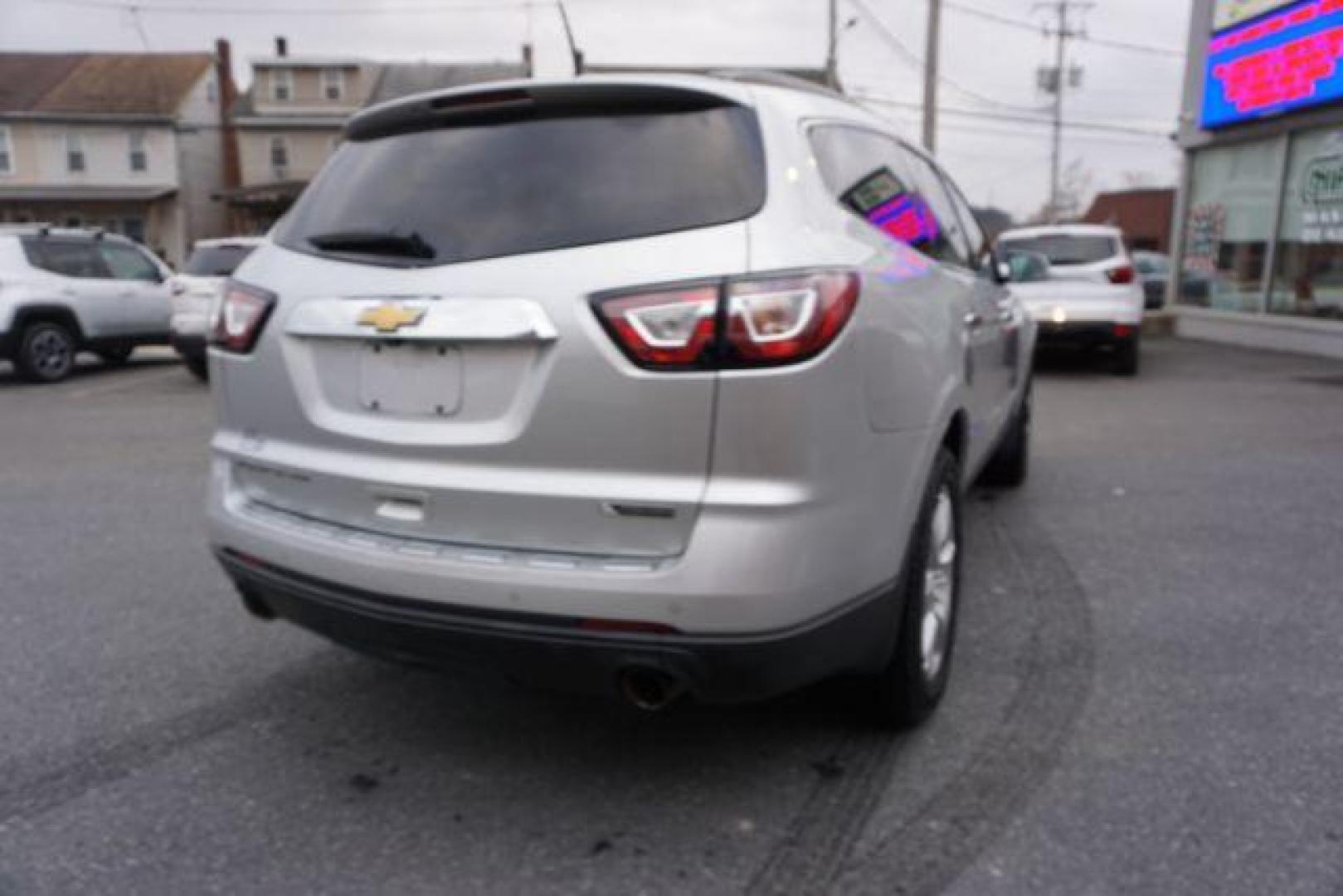 2017 Silver Ice Metallic /Ebony, premium leather Chevrolet Traverse Premier AWD (1GNKVJKD2HJ) with an 3.6L V6 DOHC 24V engine, 6-Speed Automatic transmission, located at 312 Centre Ave, Schuylkill Haven, PA, 17972, (570) 593-5278, 40.638130, -76.177383 - automatic climate control, blind spot monitor, navigation, rear parking sensors, univ garage door opener, aluminum/alloy wheels, leather seats, luggage rack, power driver's seat, power passenger seat, rear bucket seats, towing/camper pkg, driver's seat memory, heated front seats, Bose Premium Stereo - Photo#9