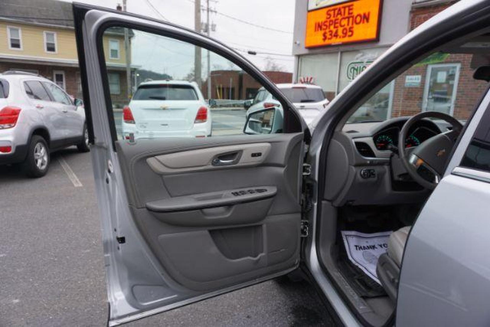 2017 Silver Ice Metallic /Ebony, premium leather Chevrolet Traverse Premier AWD (1GNKVJKD2HJ) with an 3.6L V6 DOHC 24V engine, 6-Speed Automatic transmission, located at 312 Centre Ave, Schuylkill Haven, PA, 17972, (570) 593-5278, 40.638130, -76.177383 - automatic climate control, blind spot monitor, navigation, rear parking sensors, univ garage door opener, aluminum/alloy wheels, leather seats, luggage rack, power driver's seat, power passenger seat, rear bucket seats, towing/camper pkg, driver's seat memory, heated front seats, Bose Premium Stereo - Photo#16