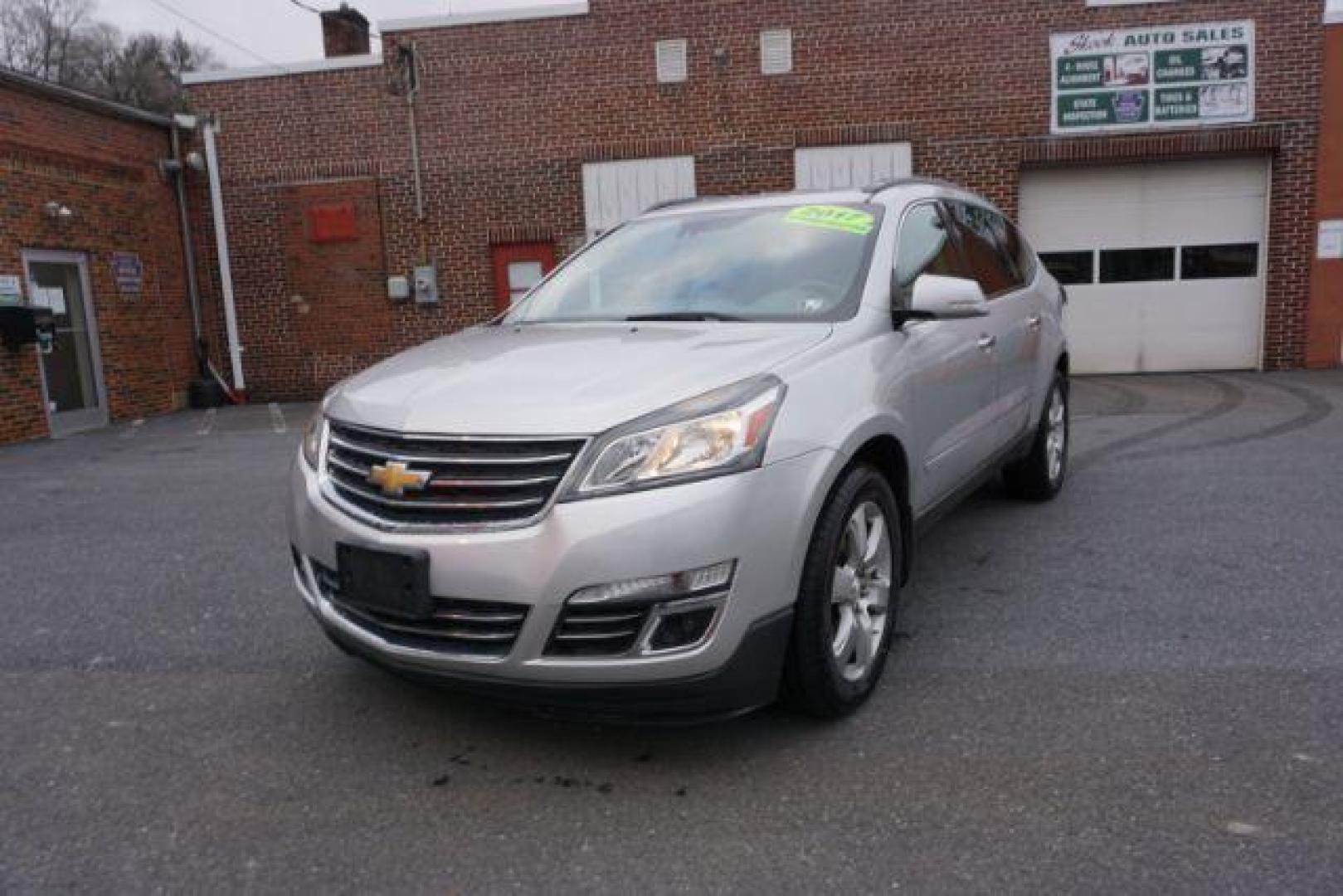 2017 Silver Ice Metallic /Ebony, premium leather Chevrolet Traverse Premier AWD (1GNKVJKD2HJ) with an 3.6L V6 DOHC 24V engine, 6-Speed Automatic transmission, located at 312 Centre Ave, Schuylkill Haven, PA, 17972, (570) 593-5278, 40.638130, -76.177383 - automatic climate control, blind spot monitor, navigation, rear parking sensors, univ garage door opener, aluminum/alloy wheels, leather seats, luggage rack, power driver's seat, power passenger seat, rear bucket seats, towing/camper pkg, driver's seat memory, heated front seats, Bose Premium Stereo - Photo#2