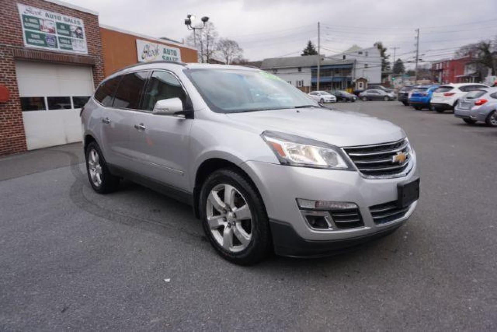 2017 Silver Ice Metallic /Ebony, premium leather Chevrolet Traverse Premier AWD (1GNKVJKD2HJ) with an 3.6L V6 DOHC 24V engine, 6-Speed Automatic transmission, located at 312 Centre Ave, Schuylkill Haven, PA, 17972, (570) 593-5278, 40.638130, -76.177383 - automatic climate control, blind spot monitor, navigation, rear parking sensors, univ garage door opener, aluminum/alloy wheels, leather seats, luggage rack, power driver's seat, power passenger seat, rear bucket seats, towing/camper pkg, driver's seat memory, heated front seats, Bose Premium Stereo - Photo#4