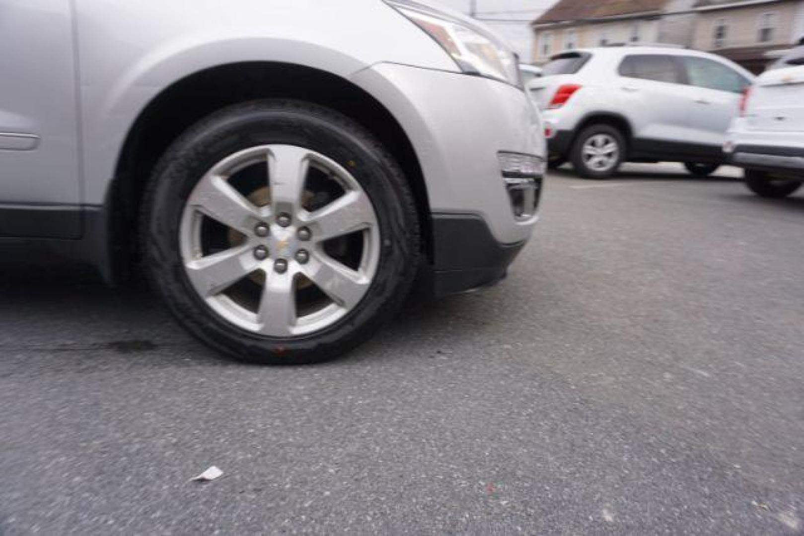 2017 Silver Ice Metallic /Ebony, premium leather Chevrolet Traverse Premier AWD (1GNKVJKD2HJ) with an 3.6L V6 DOHC 24V engine, 6-Speed Automatic transmission, located at 312 Centre Ave, Schuylkill Haven, PA, 17972, (570) 593-5278, 40.638130, -76.177383 - automatic climate control, blind spot monitor, navigation, rear parking sensors, univ garage door opener, aluminum/alloy wheels, leather seats, luggage rack, power driver's seat, power passenger seat, rear bucket seats, towing/camper pkg, driver's seat memory, heated front seats, Bose Premium Stereo - Photo#5