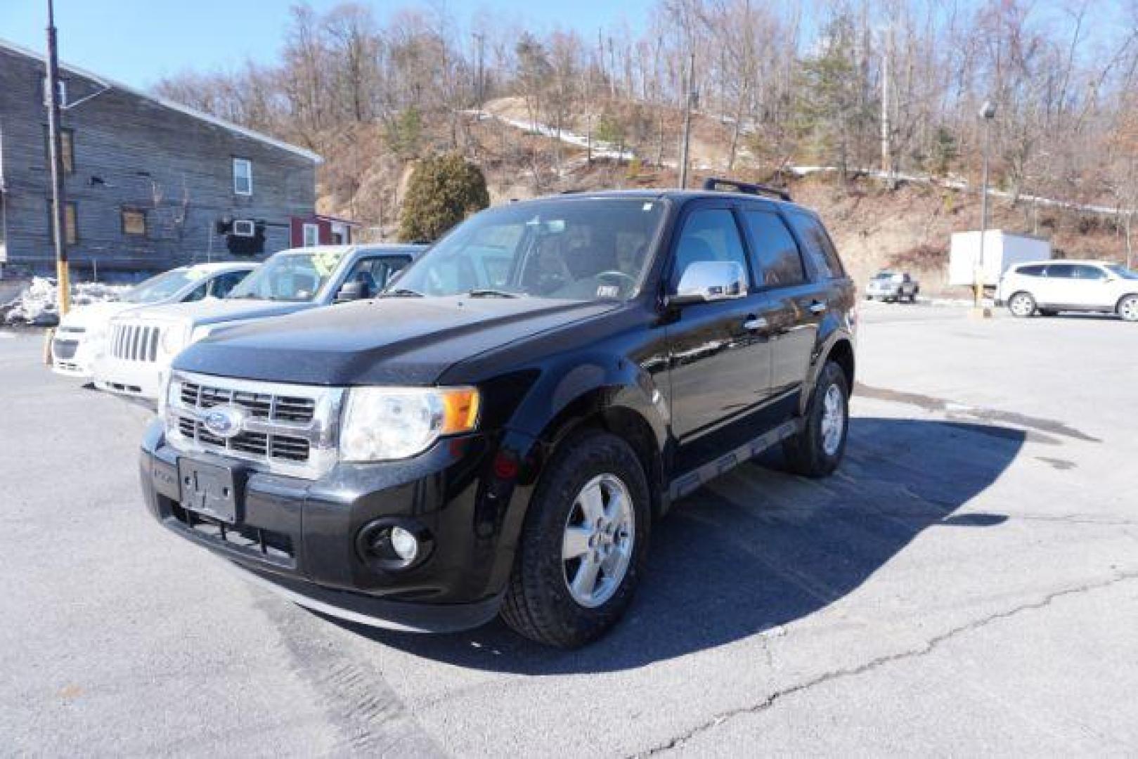 2014 White Platinum Tricoat /Medium Light Stone Ford Escape SE 4WD (1FMCU9GX4EU) with an 1.6L L4 DOHC 16V engine, 6-Speed Automatic transmission, located at 312 Centre Ave, Schuylkill Haven, PA, 17972, (570) 593-5278, 40.638130, -76.177383 - Photo#0