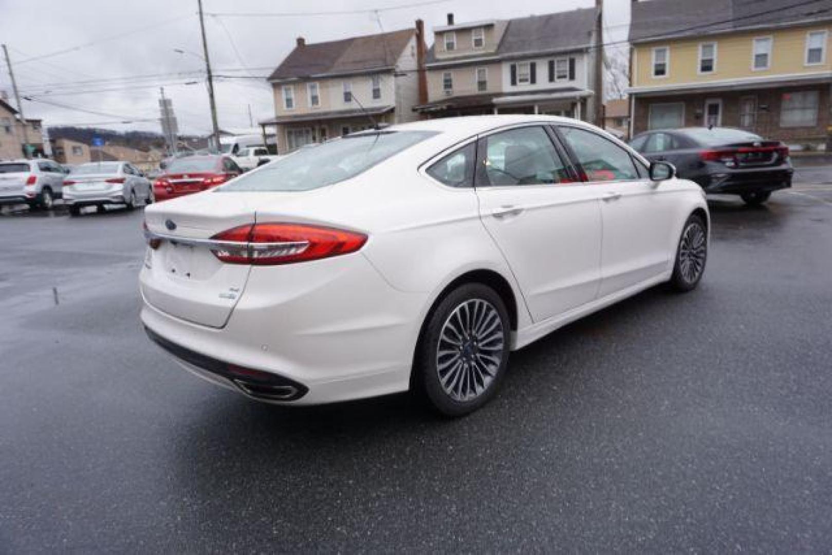 2017 White Platinum Metallic Tri-Coat /Ebony, leather Ford Fusion SE AWD (3FA6P0T90HR) with an 2.0L L4 DOHC 16V engine, 6-Speed Automatic transmission, located at 312 Centre Ave, Schuylkill Haven, PA, 17972, (570) 593-5278, 40.638130, -76.177383 - adaptive cruise control, automatic climate control, blind spot monitor, collision avoidance, drivers seat memory, fog lights, heated exterior mirrors, heated front seats, lane departure warning, leather seats, navigation system, passive keyless entry, rear parking sensors, remote engine starter - Photo#12