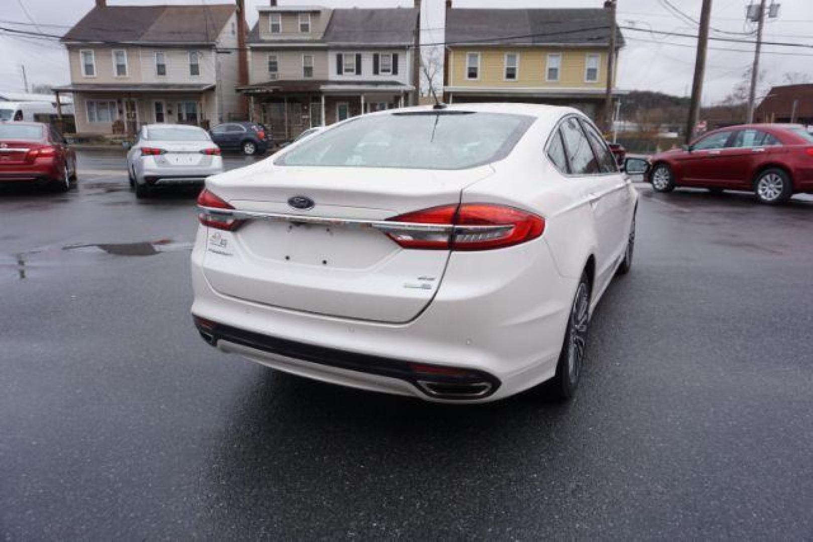 2017 White Platinum Metallic Tri-Coat /Ebony, leather Ford Fusion SE AWD (3FA6P0T90HR) with an 2.0L L4 DOHC 16V engine, 6-Speed Automatic transmission, located at 312 Centre Ave, Schuylkill Haven, PA, 17972, (570) 593-5278, 40.638130, -76.177383 - adaptive cruise control, automatic climate control, blind spot monitor, collision avoidance, drivers seat memory, fog lights, heated exterior mirrors, heated front seats, lane departure warning, leather seats, navigation system, passive keyless entry, rear parking sensors, remote engine starter - Photo#13