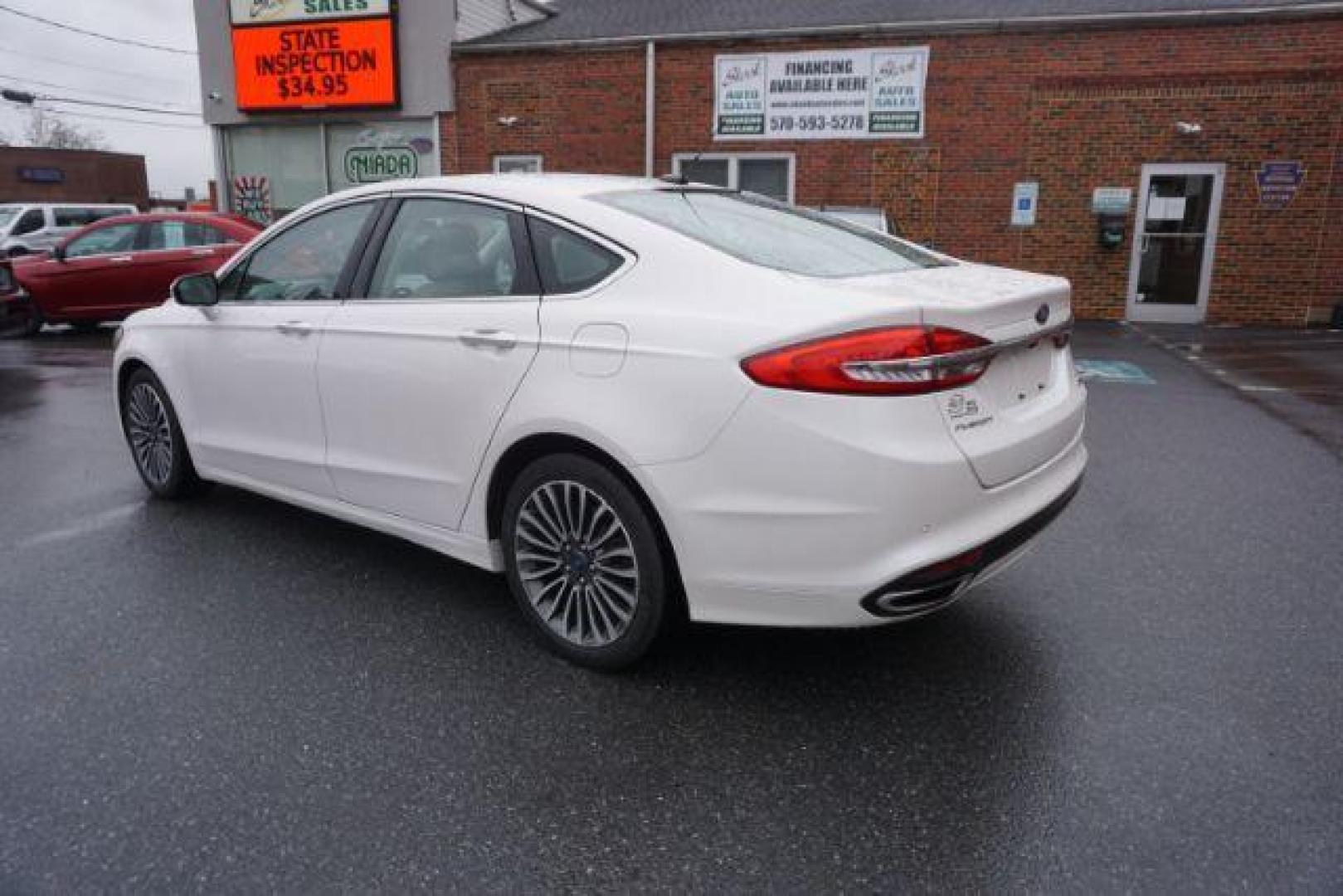 2017 White Platinum Metallic Tri-Coat /Ebony, leather Ford Fusion SE AWD (3FA6P0T90HR) with an 2.0L L4 DOHC 16V engine, 6-Speed Automatic transmission, located at 312 Centre Ave, Schuylkill Haven, PA, 17972, (570) 593-5278, 40.638130, -76.177383 - adaptive cruise control, automatic climate control, blind spot monitor, collision avoidance, drivers seat memory, fog lights, heated exterior mirrors, heated front seats, lane departure warning, leather seats, navigation system, passive keyless entry, rear parking sensors, remote engine starter - Photo#16