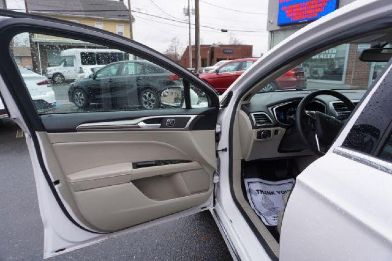 2017 White Platinum Metallic Tri-Coat /Ebony, leather Ford Fusion SE AWD (3FA6P0T90HR) with an 2.0L L4 DOHC 16V engine, 6-Speed Automatic transmission, located at 312 Centre Ave, Schuylkill Haven, PA, 17972, (570) 593-5278, 40.638130, -76.177383 - adaptive cruise control, automatic climate control, blind spot monitor, collision avoidance, drivers seat memory, fog lights, heated exterior mirrors, heated front seats, lane departure warning, leather seats, navigation system, passive keyless entry, rear parking sensors, remote engine starter - Photo#17