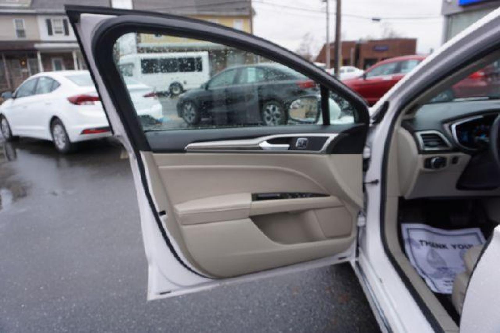 2017 White Platinum Metallic Tri-Coat /Ebony, leather Ford Fusion SE AWD (3FA6P0T90HR) with an 2.0L L4 DOHC 16V engine, 6-Speed Automatic transmission, located at 312 Centre Ave, Schuylkill Haven, PA, 17972, (570) 593-5278, 40.638130, -76.177383 - adaptive cruise control, automatic climate control, blind spot monitor, collision avoidance, drivers seat memory, fog lights, heated exterior mirrors, heated front seats, lane departure warning, leather seats, navigation system, passive keyless entry, rear parking sensors, remote engine starter - Photo#18