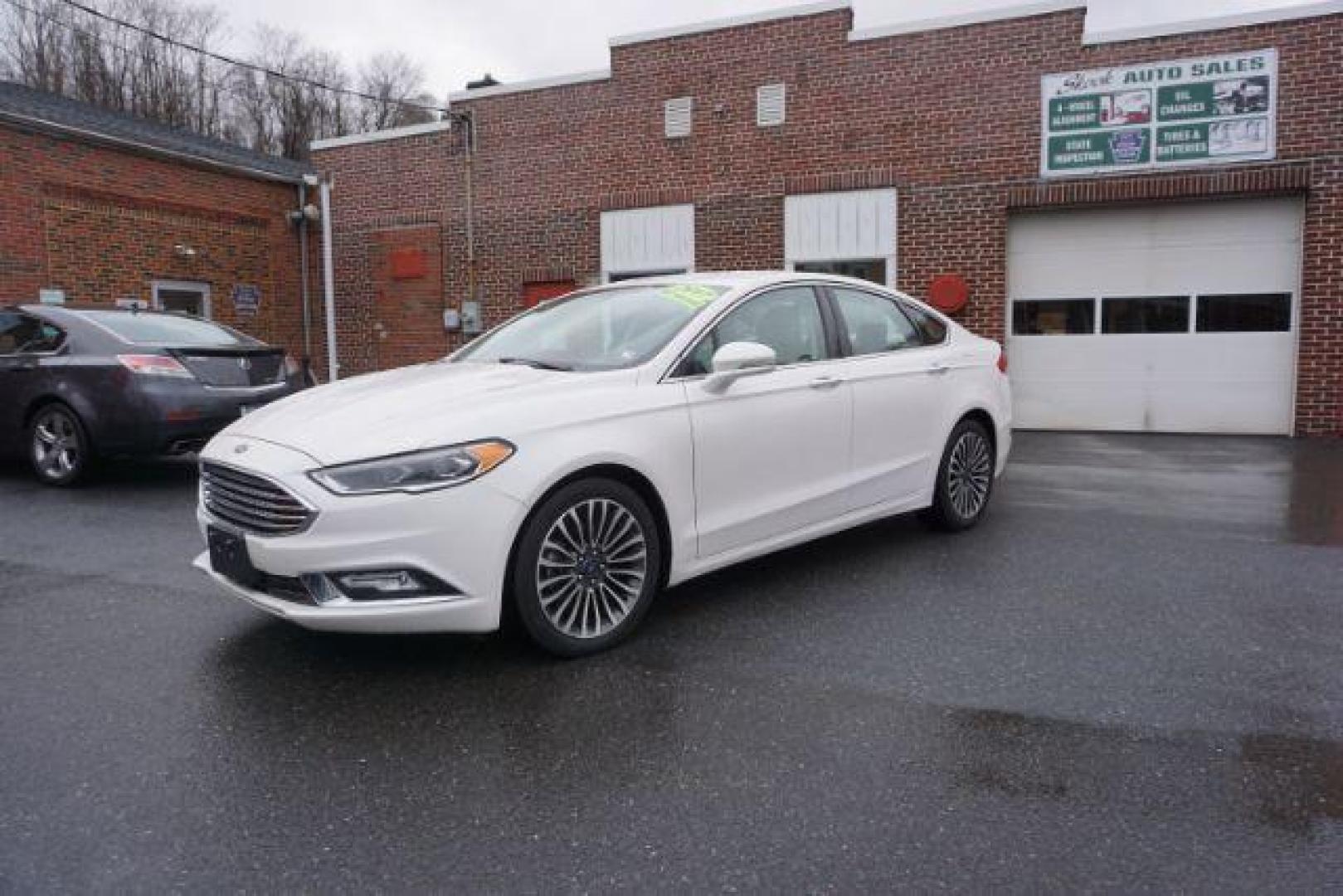 2017 White Platinum Metallic Tri-Coat /Ebony, leather Ford Fusion SE AWD (3FA6P0T90HR) with an 2.0L L4 DOHC 16V engine, 6-Speed Automatic transmission, located at 312 Centre Ave, Schuylkill Haven, PA, 17972, (570) 593-5278, 40.638130, -76.177383 - adaptive cruise control, automatic climate control, blind spot monitor, collision avoidance, drivers seat memory, fog lights, heated exterior mirrors, heated front seats, lane departure warning, leather seats, navigation system, passive keyless entry, rear parking sensors, remote engine starter - Photo#1