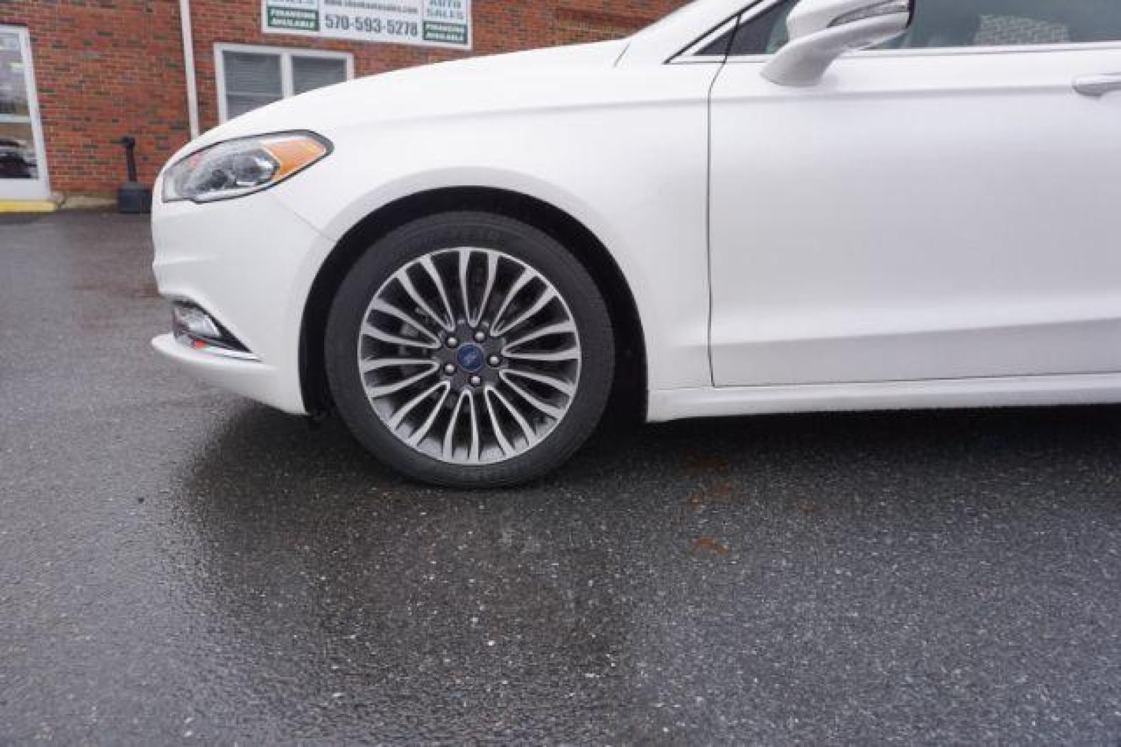 2017 White Platinum Metallic Tri-Coat /Ebony, leather Ford Fusion SE AWD (3FA6P0T90HR) with an 2.0L L4 DOHC 16V engine, 6-Speed Automatic transmission, located at 312 Centre Ave, Schuylkill Haven, PA, 17972, (570) 593-5278, 40.638130, -76.177383 - adaptive cruise control, automatic climate control, blind spot monitor, collision avoidance, drivers seat memory, fog lights, heated exterior mirrors, heated front seats, lane departure warning, leather seats, navigation system, passive keyless entry, rear parking sensors, remote engine starter - Photo#2