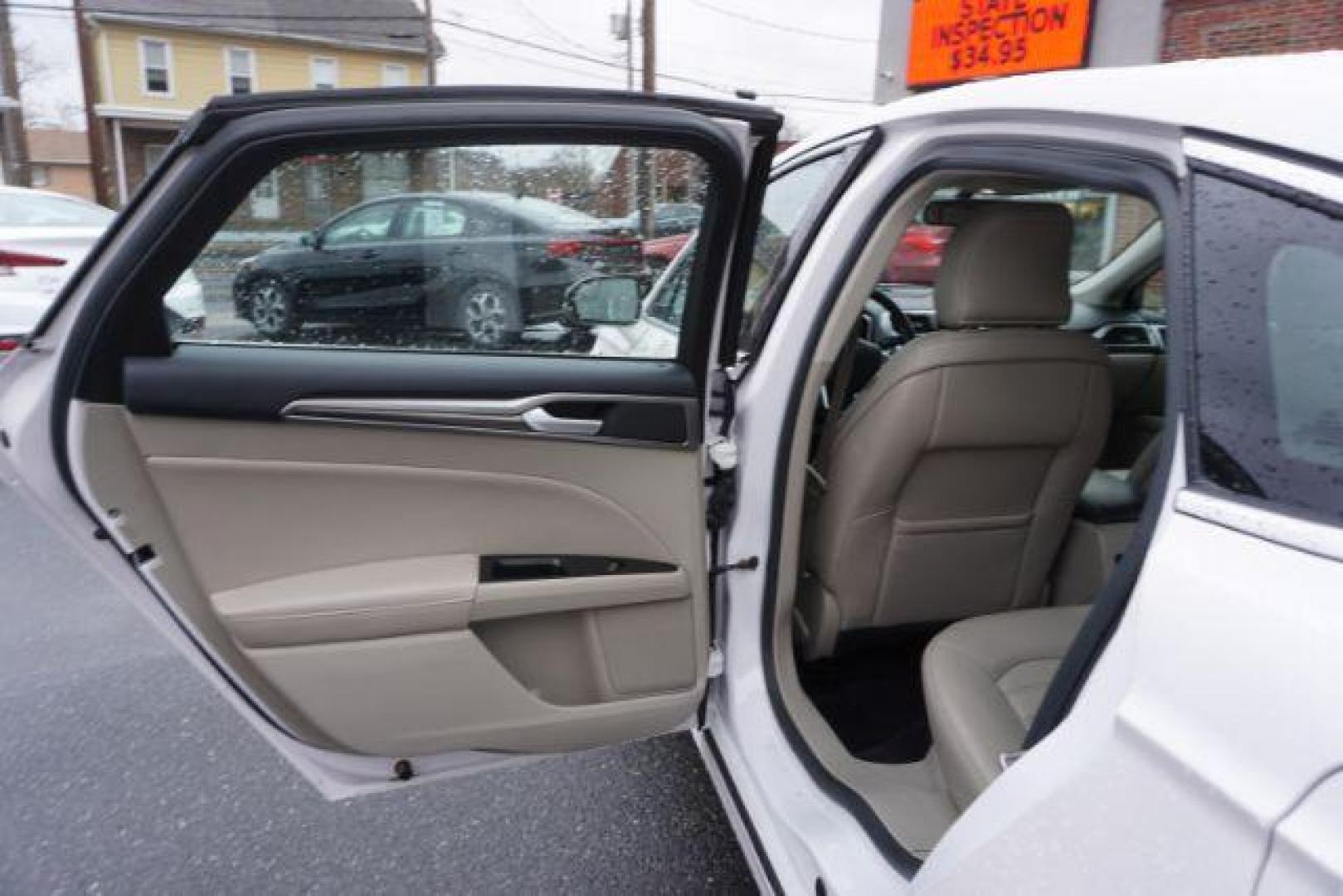 2017 White Platinum Metallic Tri-Coat /Ebony, leather Ford Fusion SE AWD (3FA6P0T90HR) with an 2.0L L4 DOHC 16V engine, 6-Speed Automatic transmission, located at 312 Centre Ave, Schuylkill Haven, PA, 17972, (570) 593-5278, 40.638130, -76.177383 - adaptive cruise control, automatic climate control, blind spot monitor, collision avoidance, drivers seat memory, fog lights, heated exterior mirrors, heated front seats, lane departure warning, leather seats, navigation system, passive keyless entry, rear parking sensors, remote engine starter - Photo#30