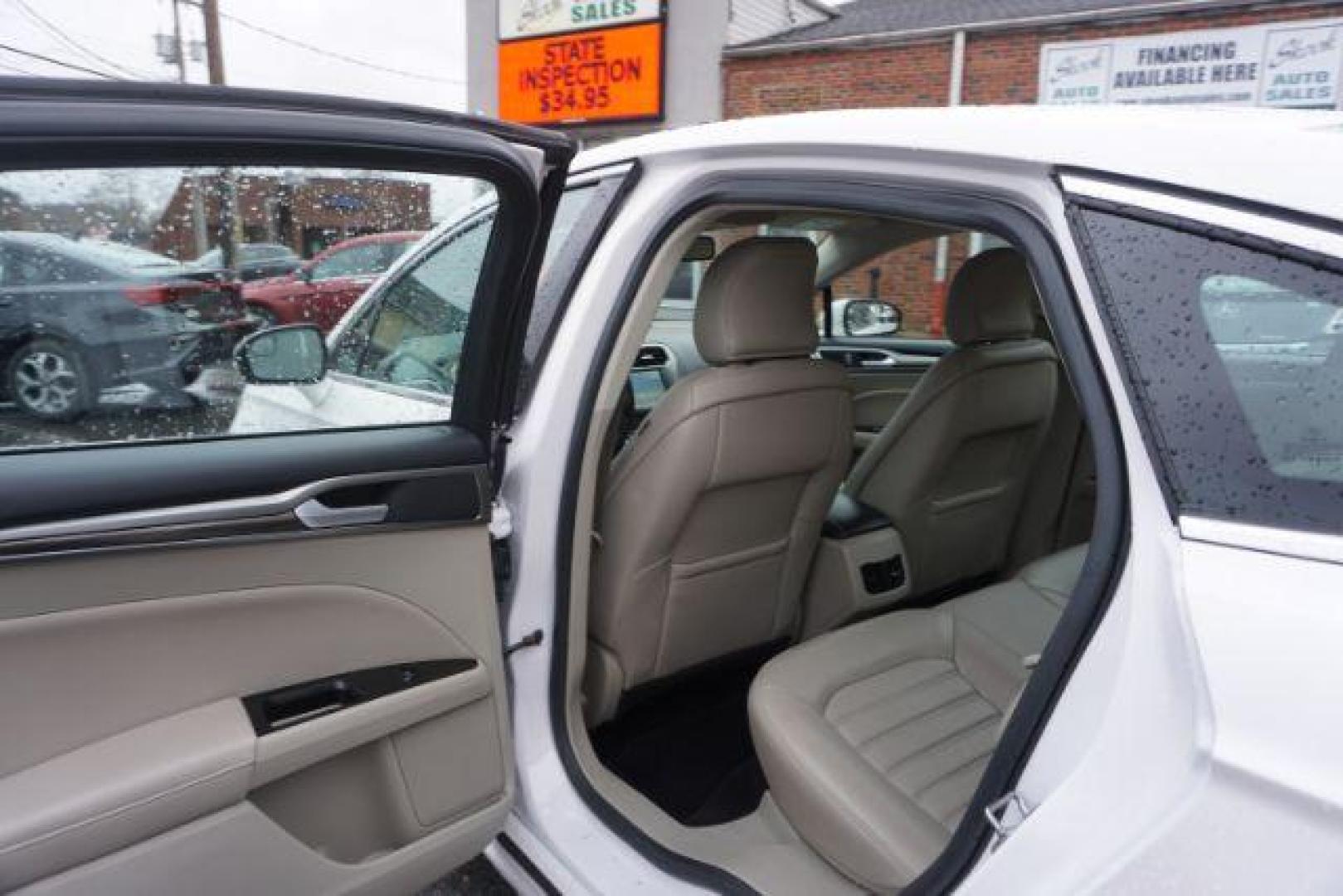 2017 White Platinum Metallic Tri-Coat /Ebony, leather Ford Fusion SE AWD (3FA6P0T90HR) with an 2.0L L4 DOHC 16V engine, 6-Speed Automatic transmission, located at 312 Centre Ave, Schuylkill Haven, PA, 17972, (570) 593-5278, 40.638130, -76.177383 - adaptive cruise control, automatic climate control, blind spot monitor, collision avoidance, drivers seat memory, fog lights, heated exterior mirrors, heated front seats, lane departure warning, leather seats, navigation system, passive keyless entry, rear parking sensors, remote engine starter - Photo#32