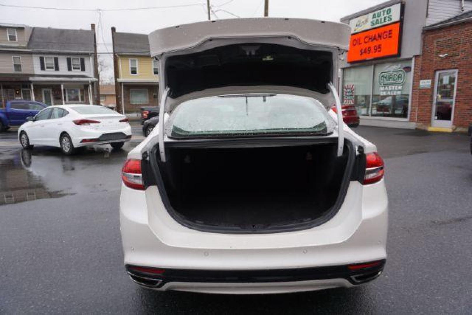 2017 White Platinum Metallic Tri-Coat /Ebony, leather Ford Fusion SE AWD (3FA6P0T90HR) with an 2.0L L4 DOHC 16V engine, 6-Speed Automatic transmission, located at 312 Centre Ave, Schuylkill Haven, PA, 17972, (570) 593-5278, 40.638130, -76.177383 - adaptive cruise control, automatic climate control, blind spot monitor, collision avoidance, drivers seat memory, fog lights, heated exterior mirrors, heated front seats, lane departure warning, leather seats, navigation system, passive keyless entry, rear parking sensors, remote engine starter - Photo#40