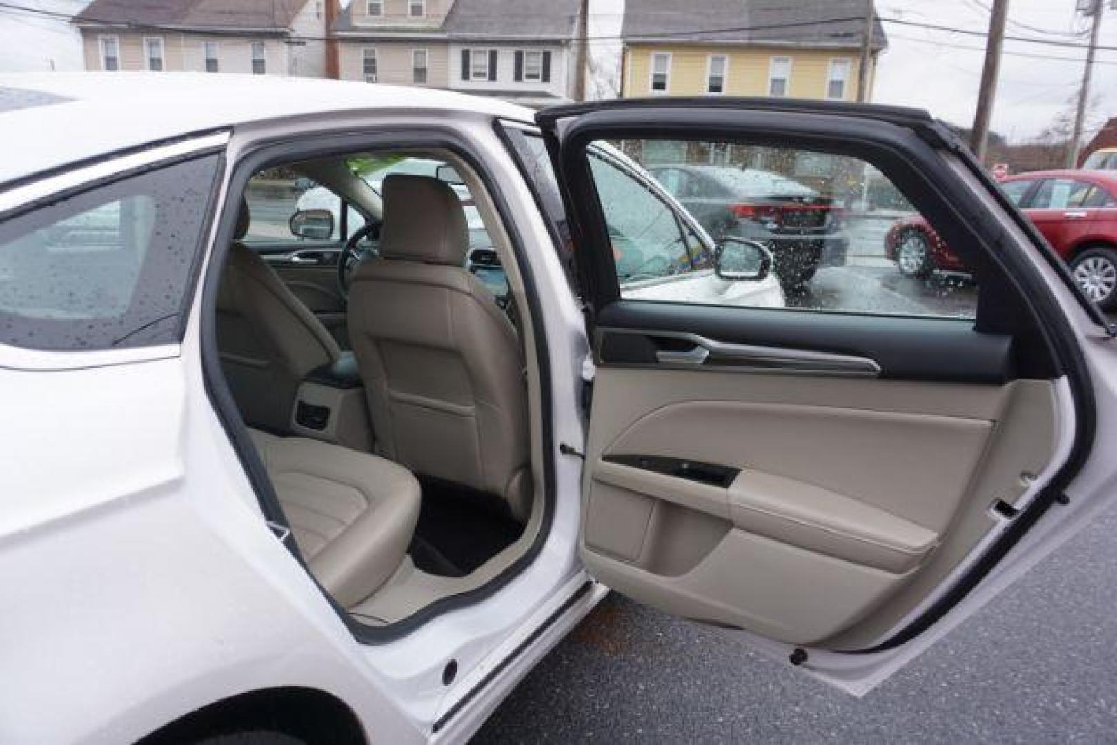 2017 White Platinum Metallic Tri-Coat /Ebony, leather Ford Fusion SE AWD (3FA6P0T90HR) with an 2.0L L4 DOHC 16V engine, 6-Speed Automatic transmission, located at 312 Centre Ave, Schuylkill Haven, PA, 17972, (570) 593-5278, 40.638130, -76.177383 - adaptive cruise control, automatic climate control, blind spot monitor, collision avoidance, drivers seat memory, fog lights, heated exterior mirrors, heated front seats, lane departure warning, leather seats, navigation system, passive keyless entry, rear parking sensors, remote engine starter - Photo#41