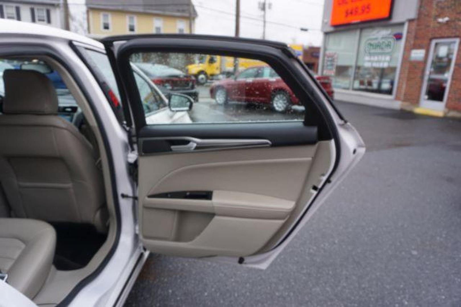 2017 White Platinum Metallic Tri-Coat /Ebony, leather Ford Fusion SE AWD (3FA6P0T90HR) with an 2.0L L4 DOHC 16V engine, 6-Speed Automatic transmission, located at 312 Centre Ave, Schuylkill Haven, PA, 17972, (570) 593-5278, 40.638130, -76.177383 - adaptive cruise control, automatic climate control, blind spot monitor, collision avoidance, drivers seat memory, fog lights, heated exterior mirrors, heated front seats, lane departure warning, leather seats, navigation system, passive keyless entry, rear parking sensors, remote engine starter - Photo#42