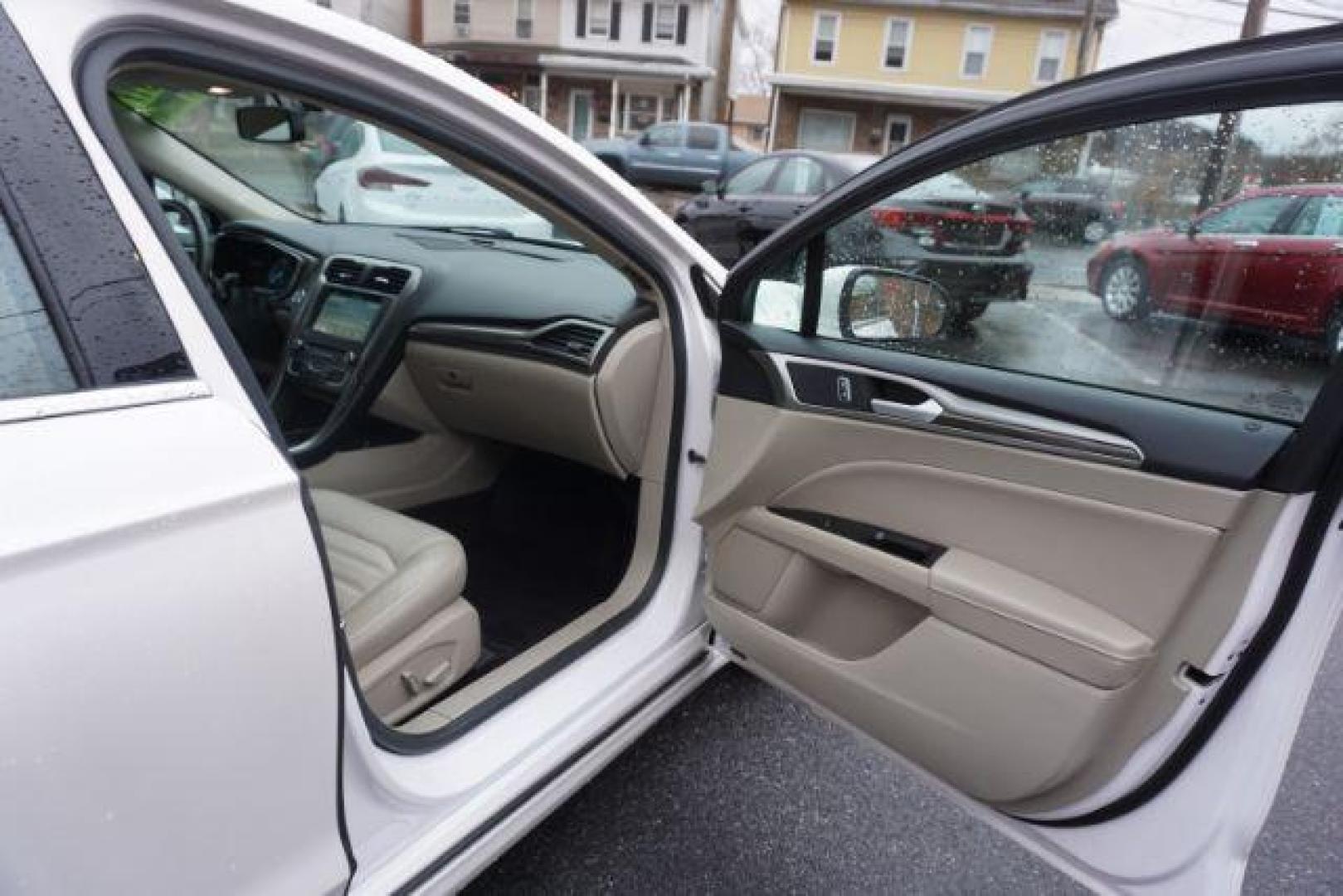 2017 White Platinum Metallic Tri-Coat /Ebony, leather Ford Fusion SE AWD (3FA6P0T90HR) with an 2.0L L4 DOHC 16V engine, 6-Speed Automatic transmission, located at 312 Centre Ave, Schuylkill Haven, PA, 17972, (570) 593-5278, 40.638130, -76.177383 - adaptive cruise control, automatic climate control, blind spot monitor, collision avoidance, drivers seat memory, fog lights, heated exterior mirrors, heated front seats, lane departure warning, leather seats, navigation system, passive keyless entry, rear parking sensors, remote engine starter - Photo#46