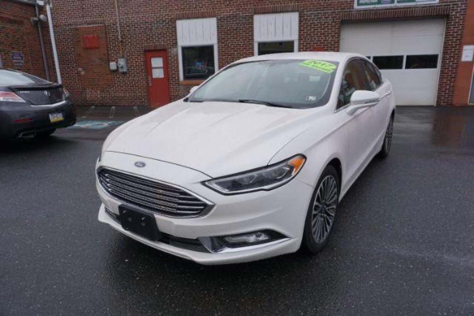 2017 White Platinum Metallic Tri-Coat /Ebony, leather Ford Fusion SE AWD (3FA6P0T90HR) with an 2.0L L4 DOHC 16V engine, 6-Speed Automatic transmission, located at 312 Centre Ave, Schuylkill Haven, PA, 17972, (570) 593-5278, 40.638130, -76.177383 - adaptive cruise control, automatic climate control, blind spot monitor, collision avoidance, drivers seat memory, fog lights, heated exterior mirrors, heated front seats, lane departure warning, leather seats, navigation system, passive keyless entry, rear parking sensors, remote engine starter - Photo#6