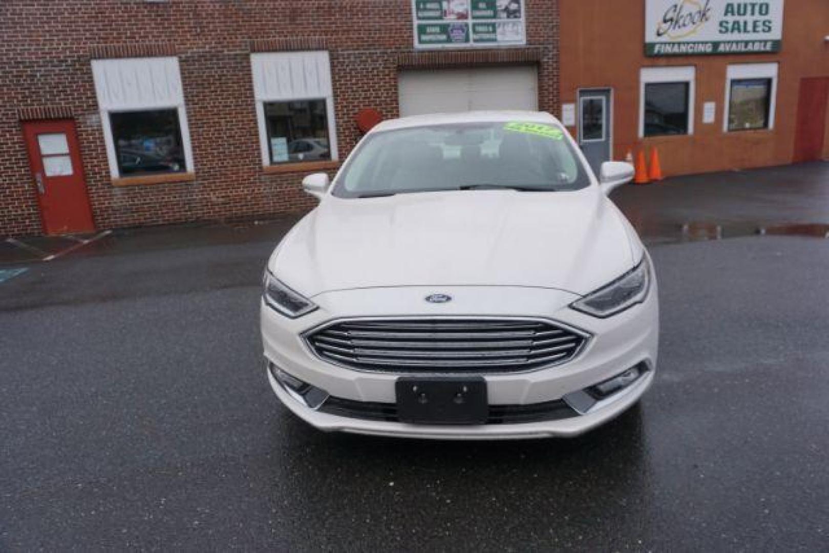 2017 White Platinum Metallic Tri-Coat /Ebony, leather Ford Fusion SE AWD (3FA6P0T90HR) with an 2.0L L4 DOHC 16V engine, 6-Speed Automatic transmission, located at 312 Centre Ave, Schuylkill Haven, PA, 17972, (570) 593-5278, 40.638130, -76.177383 - adaptive cruise control, automatic climate control, blind spot monitor, collision avoidance, drivers seat memory, fog lights, heated exterior mirrors, heated front seats, lane departure warning, leather seats, navigation system, passive keyless entry, rear parking sensors, remote engine starter - Photo#7