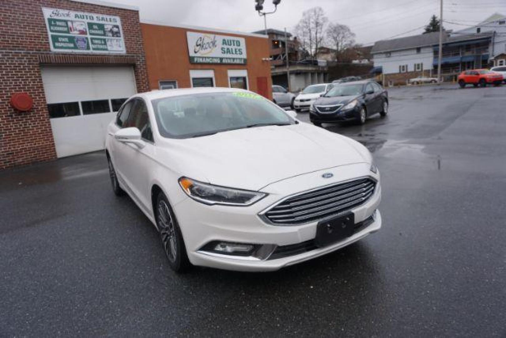 2017 White Platinum Metallic Tri-Coat /Ebony, leather Ford Fusion SE AWD (3FA6P0T90HR) with an 2.0L L4 DOHC 16V engine, 6-Speed Automatic transmission, located at 312 Centre Ave, Schuylkill Haven, PA, 17972, (570) 593-5278, 40.638130, -76.177383 - adaptive cruise control, automatic climate control, blind spot monitor, collision avoidance, drivers seat memory, fog lights, heated exterior mirrors, heated front seats, lane departure warning, leather seats, navigation system, passive keyless entry, rear parking sensors, remote engine starter - Photo#8