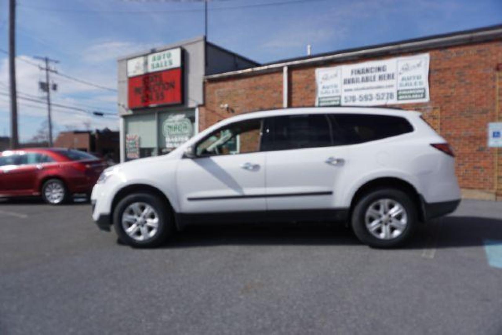 2017 Summit White Chevrolet Traverse LS FWD w/PDC (1GNKRFEDXHJ) with an 3.6L V6 DOHC 24V engine, 6-Speed Automatic transmission, located at 312 Centre Ave, Schuylkill Haven, PA, 17972, (570) 593-5278, 40.638130, -76.177383 - aluminum/alloy wheels, luggage rack, power driver's seat, rear parking sensors - Photo#4