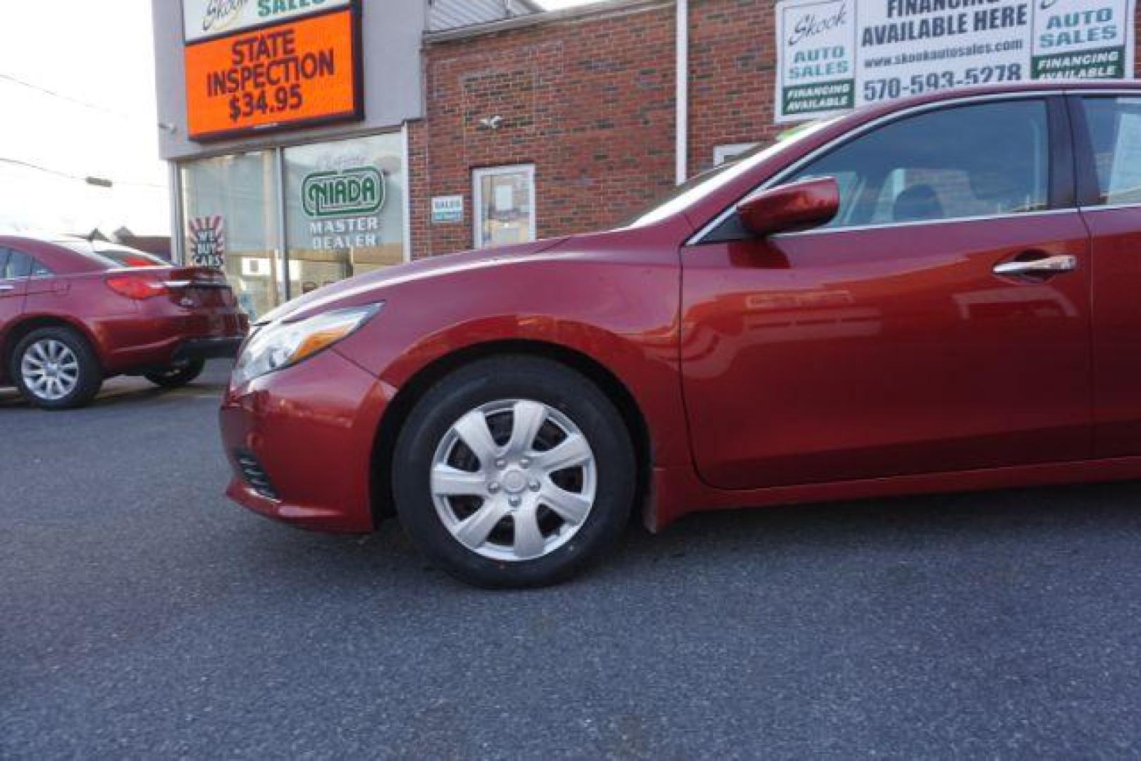 2016 Cayenne Red Nissan Altima 2.5 S (1N4AL3AP4GN) with an 2.5L L4 DOHC 16V engine, Continuously Variable Transmission transmission, located at 312 Centre Ave, Schuylkill Haven, PA, 17972, (570) 593-5278, 40.638130, -76.177383 - aluminum/alloy wheels - Photo#2