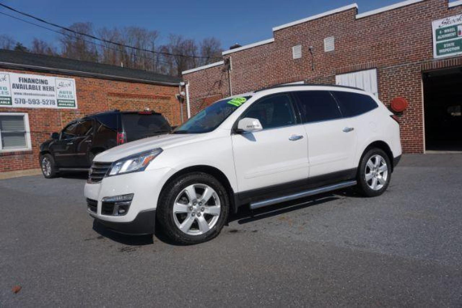 2017 Summit White Chevrolet Traverse 1LT AWD (1GNKVGKD9HJ) with an 3.6L V6 DOHC 24V engine, 6-Speed Automatic transmission, located at 312 Centre Ave, Schuylkill Haven, PA, 17972, (570) 593-5278, 40.638130, -76.177383 - Automatic climate control, fixed running boards, heated front seats, luggage rack, power driver's seat, towing package, universal garage door opener - Photo#2