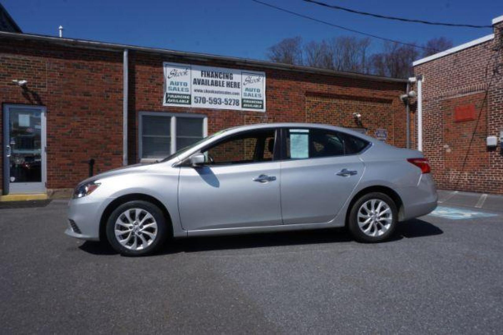 2019 Brilliant Silver /Charcoal, premium cloth Nissan Sentra SV (3N1AB7AP5KY) with an 1.8L L4 SFI DOHC 16V engine, Continuously Variable Transmission transmission, located at 312 Centre Ave, Schuylkill Haven, PA, 17972, (570) 593-5278, 40.638130, -76.177383 - Photo#0