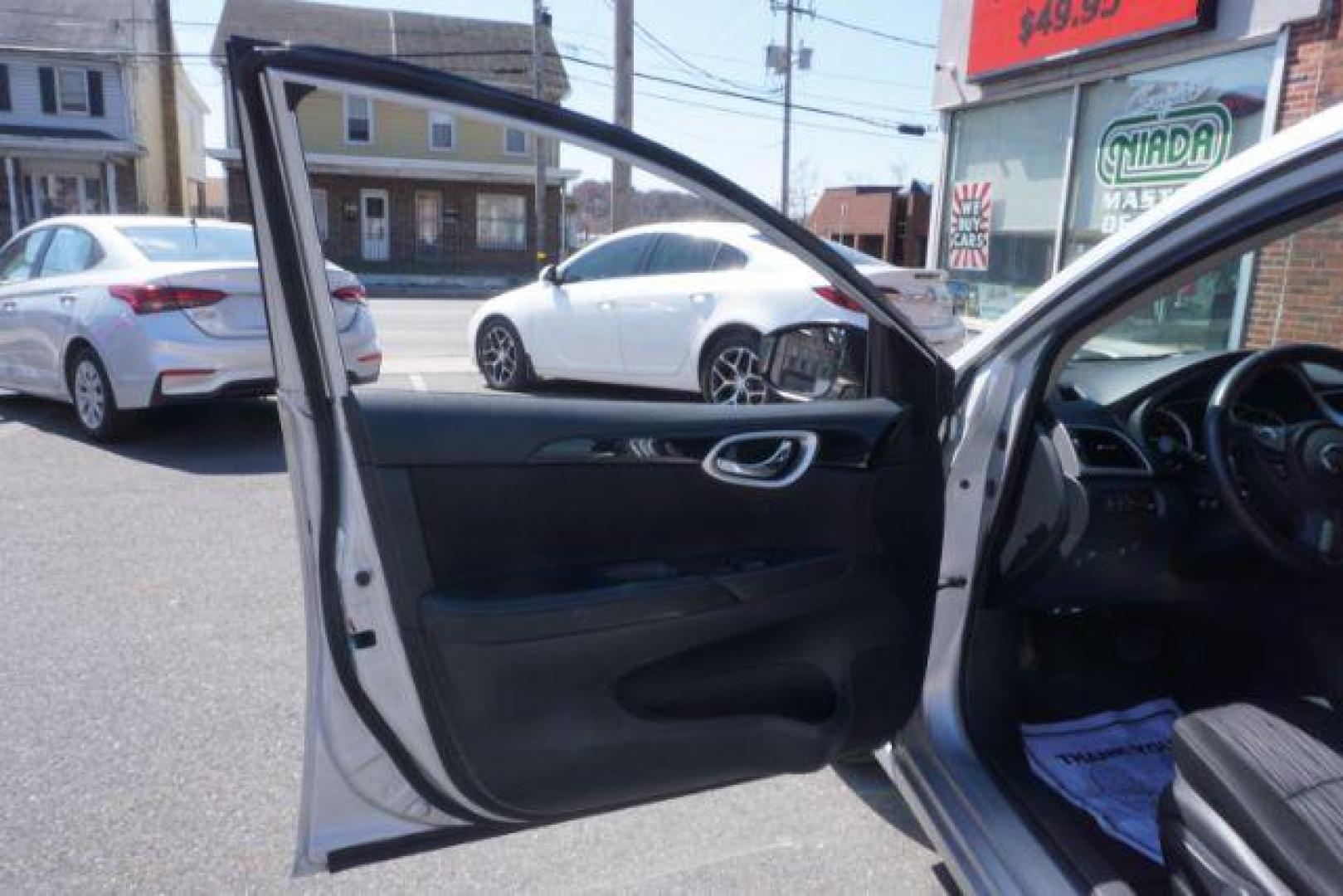 2019 Brilliant Silver /Charcoal, premium cloth Nissan Sentra SV (3N1AB7AP5KY) with an 1.8L L4 SFI DOHC 16V engine, Continuously Variable Transmission transmission, located at 312 Centre Ave, Schuylkill Haven, PA, 17972, (570) 593-5278, 40.638130, -76.177383 - Photo#18