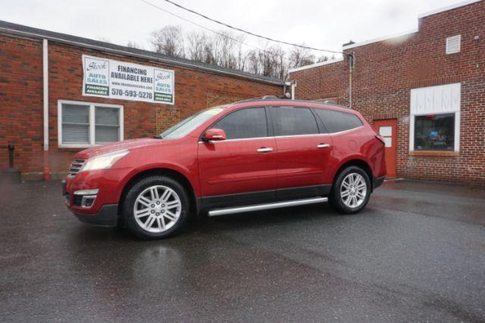 2014 Crystal Red Tintcoat /Dk Titanium/Light Titanium Chevrolet Traverse 1LT FWD (1GNKRGKD4EJ) with an 3.6L V6 DOHC 24V engine, 6-Speed Automatic transmission, located at 312 Centre Ave, Schuylkill Haven, PA, 17972, (570) 593-5278, 40.638130, -76.177383 - automatic climate control, heated front seats, power driver's seat, power sunroof, universal garage door opener - Photo#0